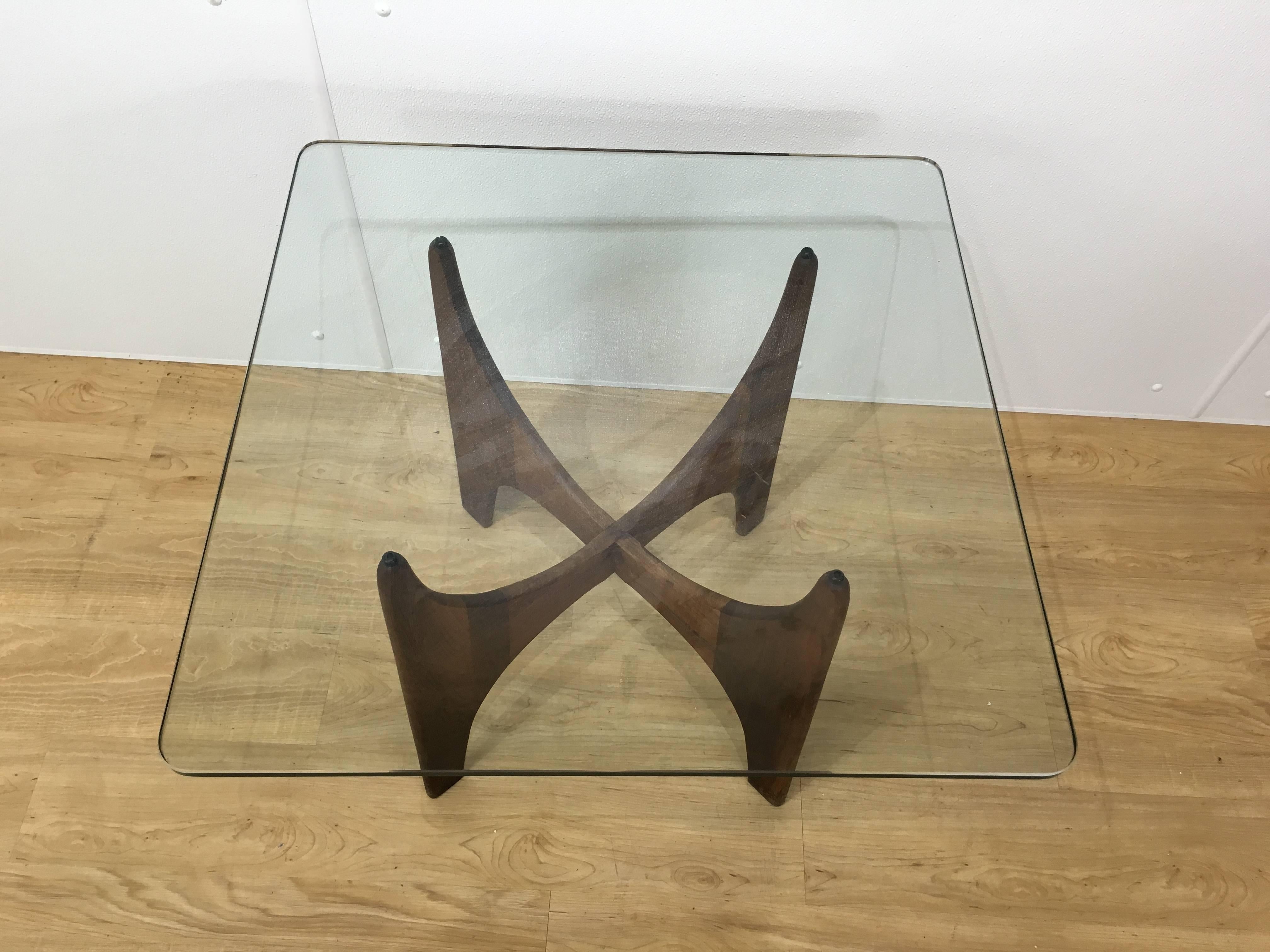 Sculptural walnut occasional table by Adrian Pearsall for Craft Associates. Classic design and scale make this piece versatile. 

Measurements of base without glass: 15.75