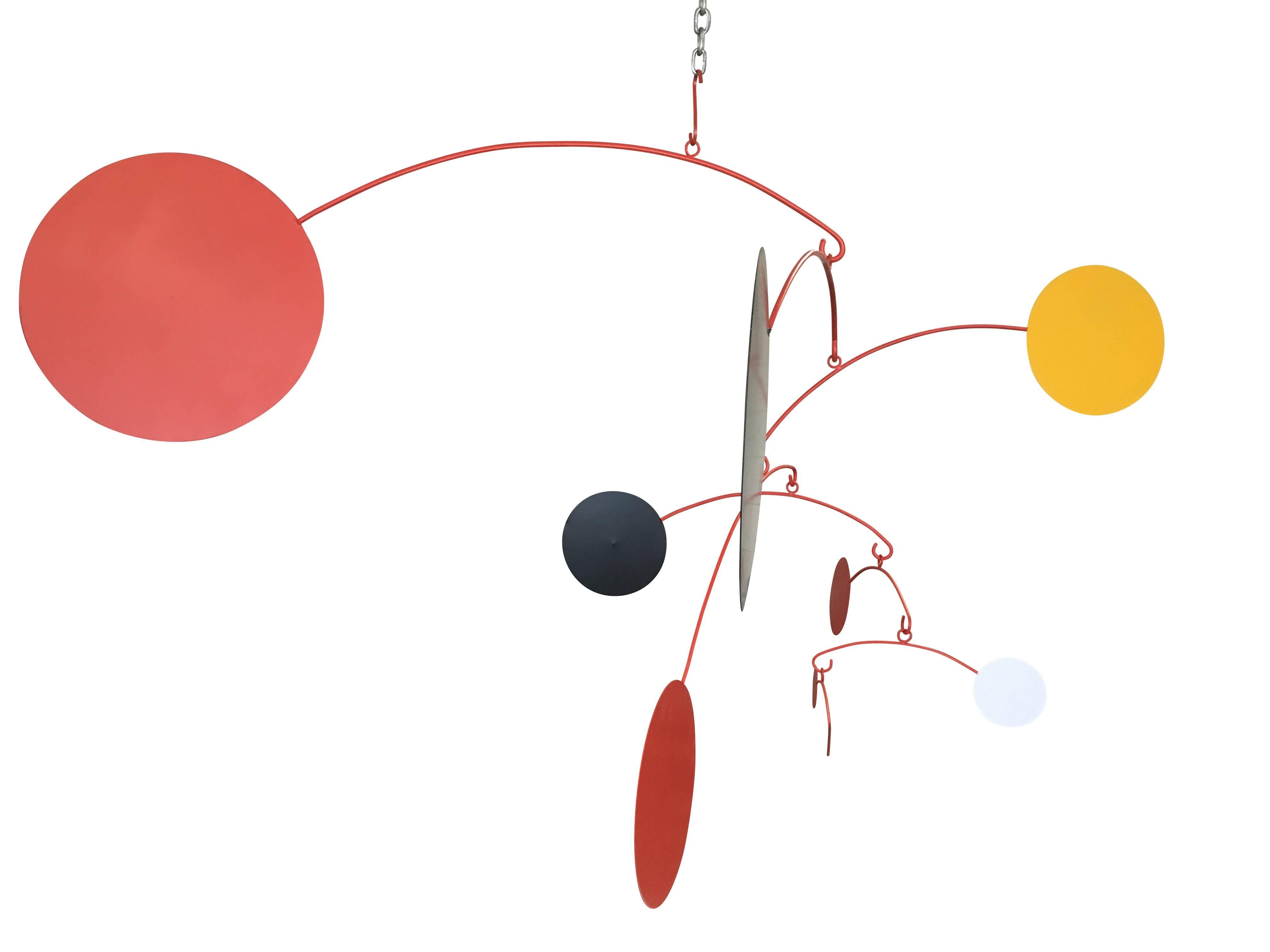 Stunning eight-arm Kinetic mobile in the manner of Alexander Calder. Eight interchangeable arms with vibrant orange, red, black, yellow and white spheres. The measurements of the mobile as shown is 64