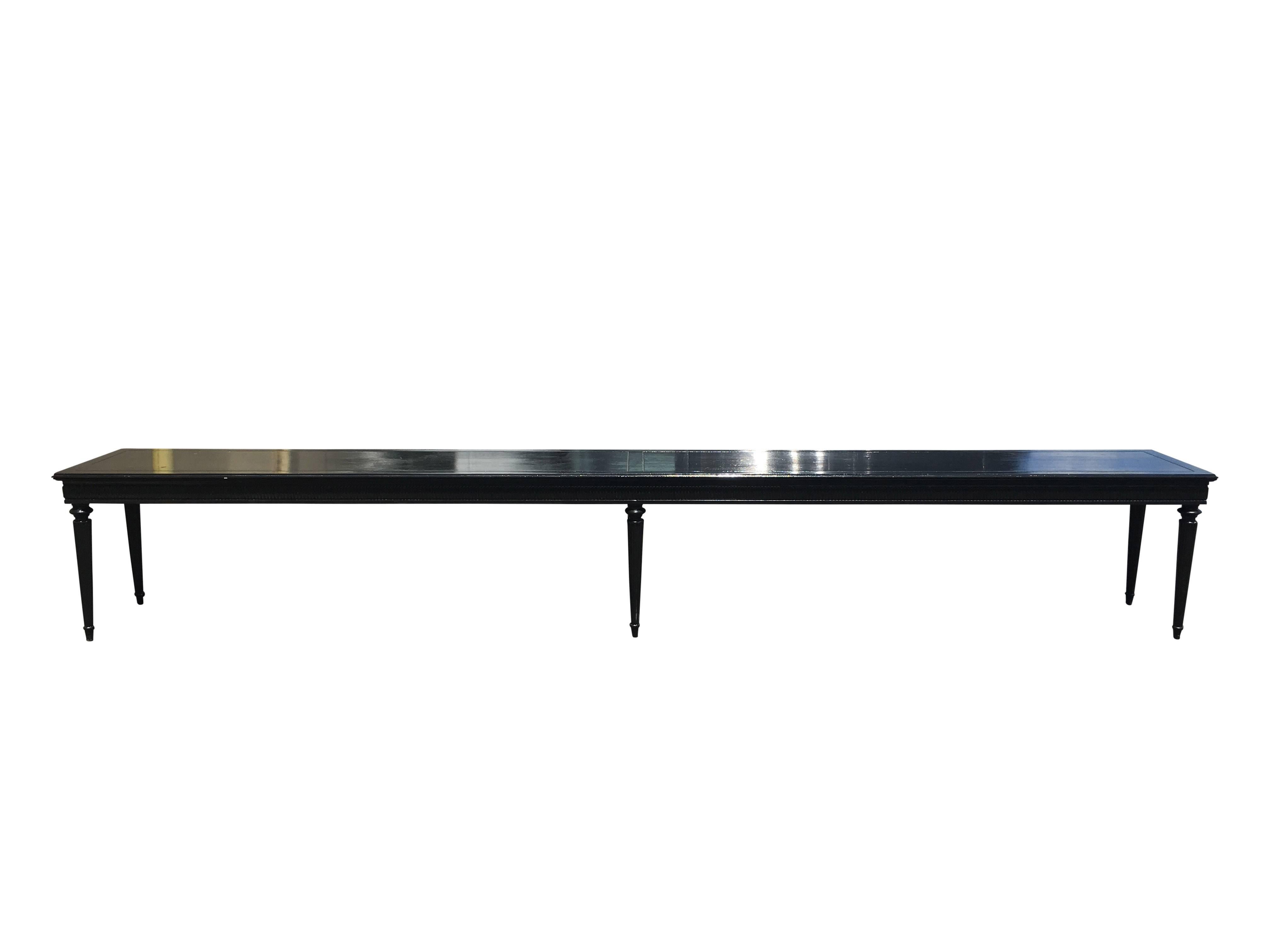 Extra long black lacquered Directoire bench or table. Twelve feet in length.