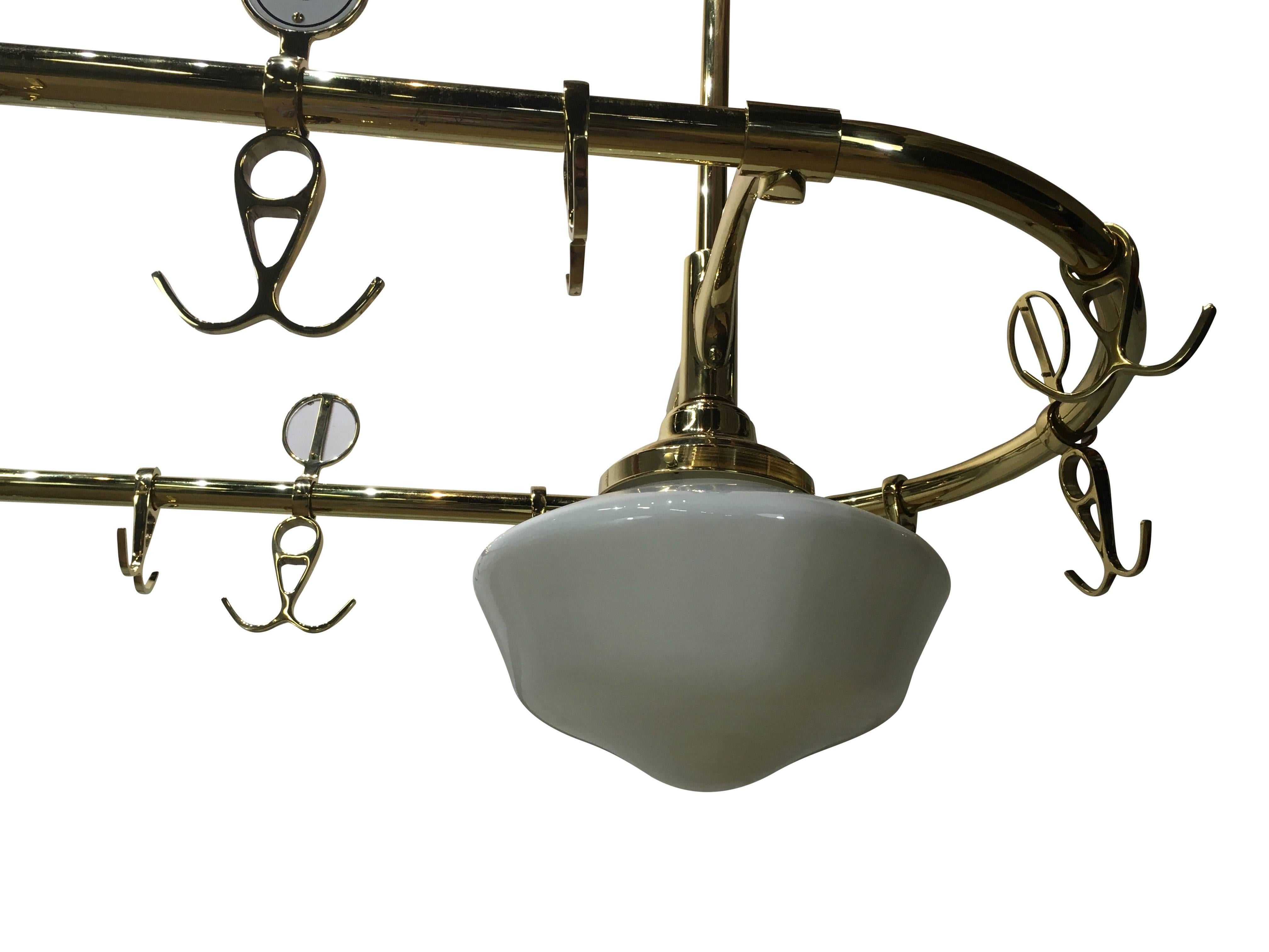 Large vintage French bistro brass chandelier/ pot rack. Rare form with twin white glass globes and oval 