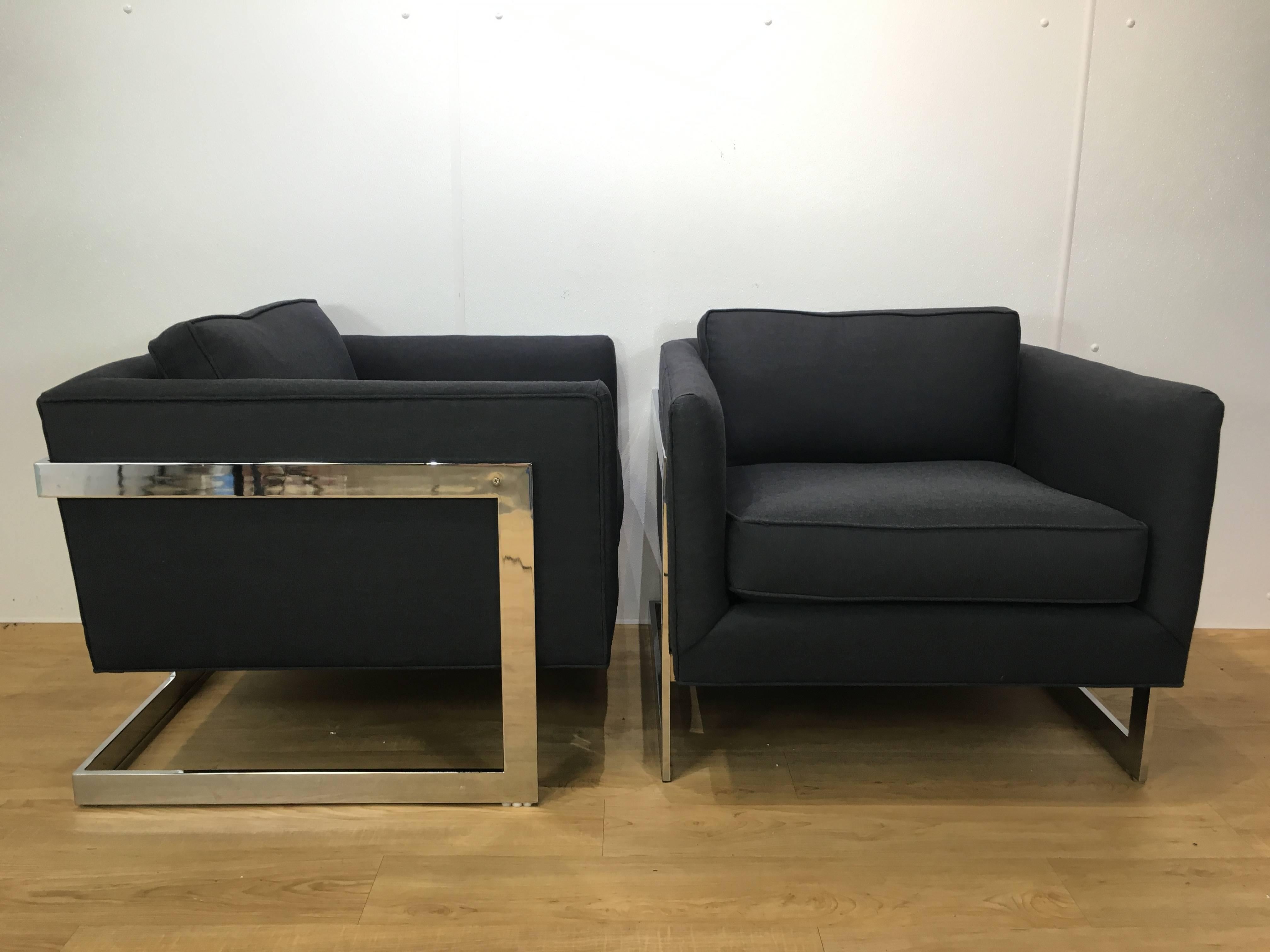 The pair of Milo Baughman cantilever club chairs, each one of typical cube form, newly upholstered.