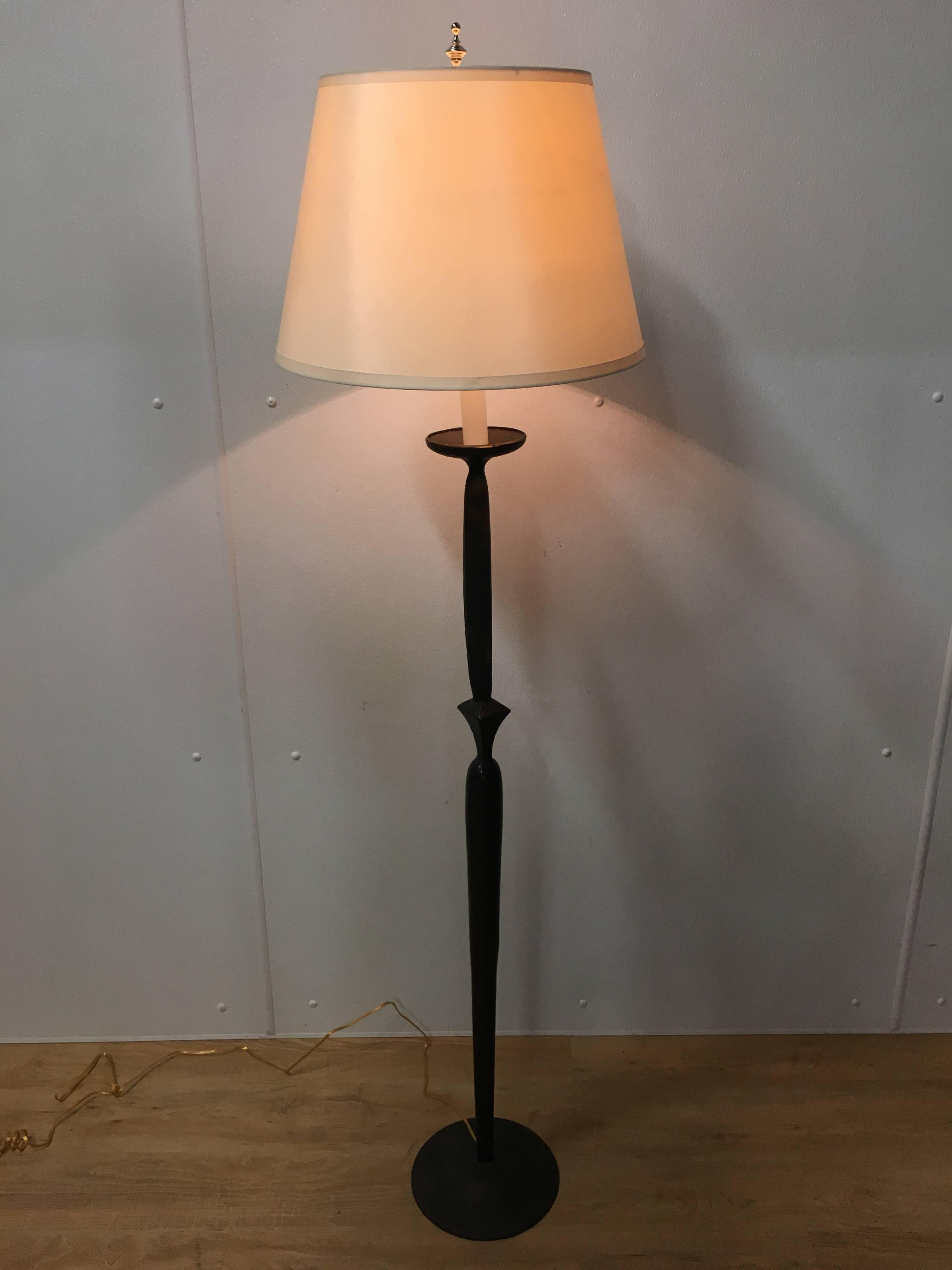 Giacometti stye bronze floor lamp. Heavy bronze construction and great curved base.