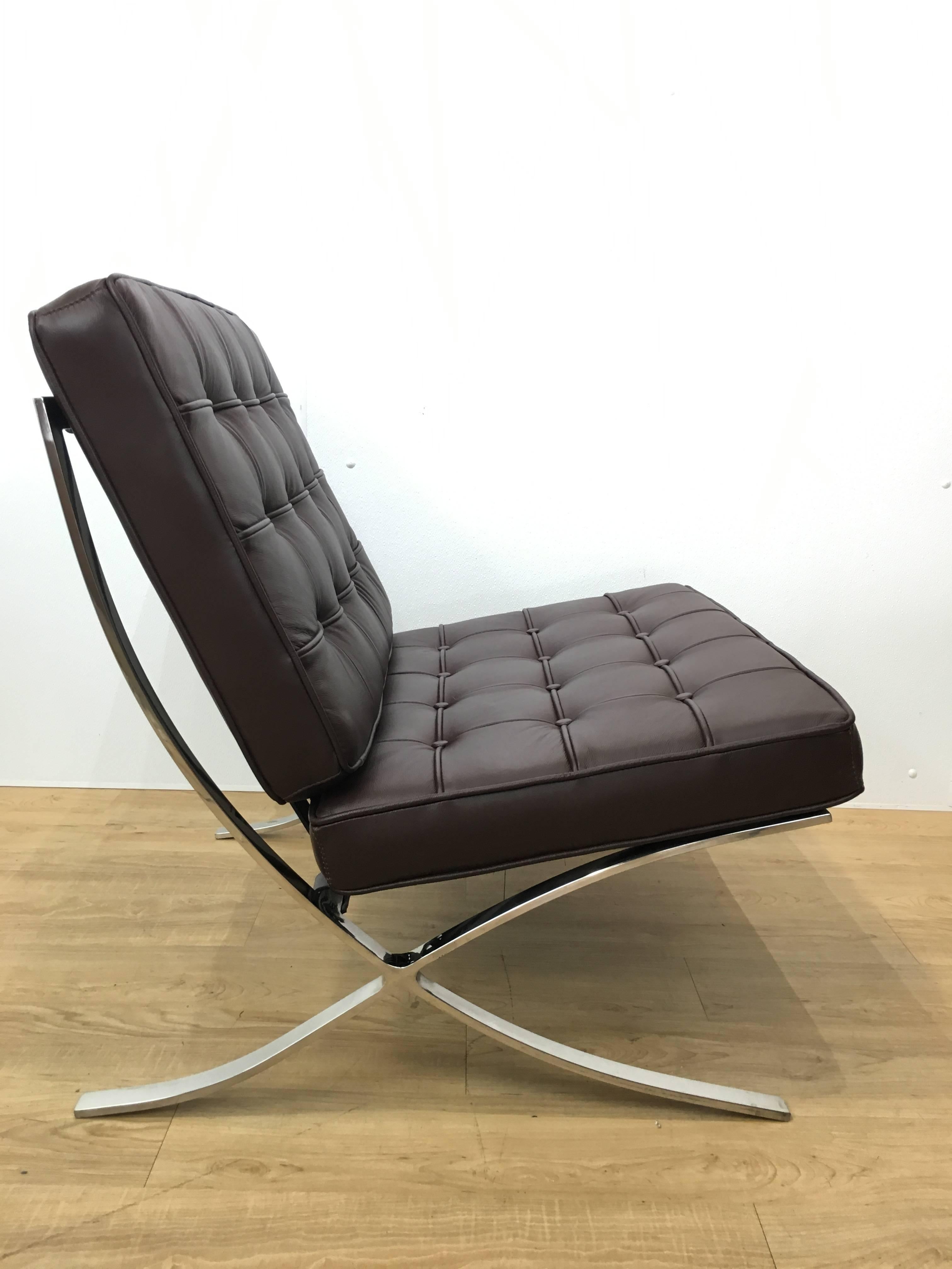 Handsome brown leather Barcelona lounge chair after the iconic  Mies van der Rohe original. A great vintage example. Great quality Italian leather with heavy chrome frame.
																											