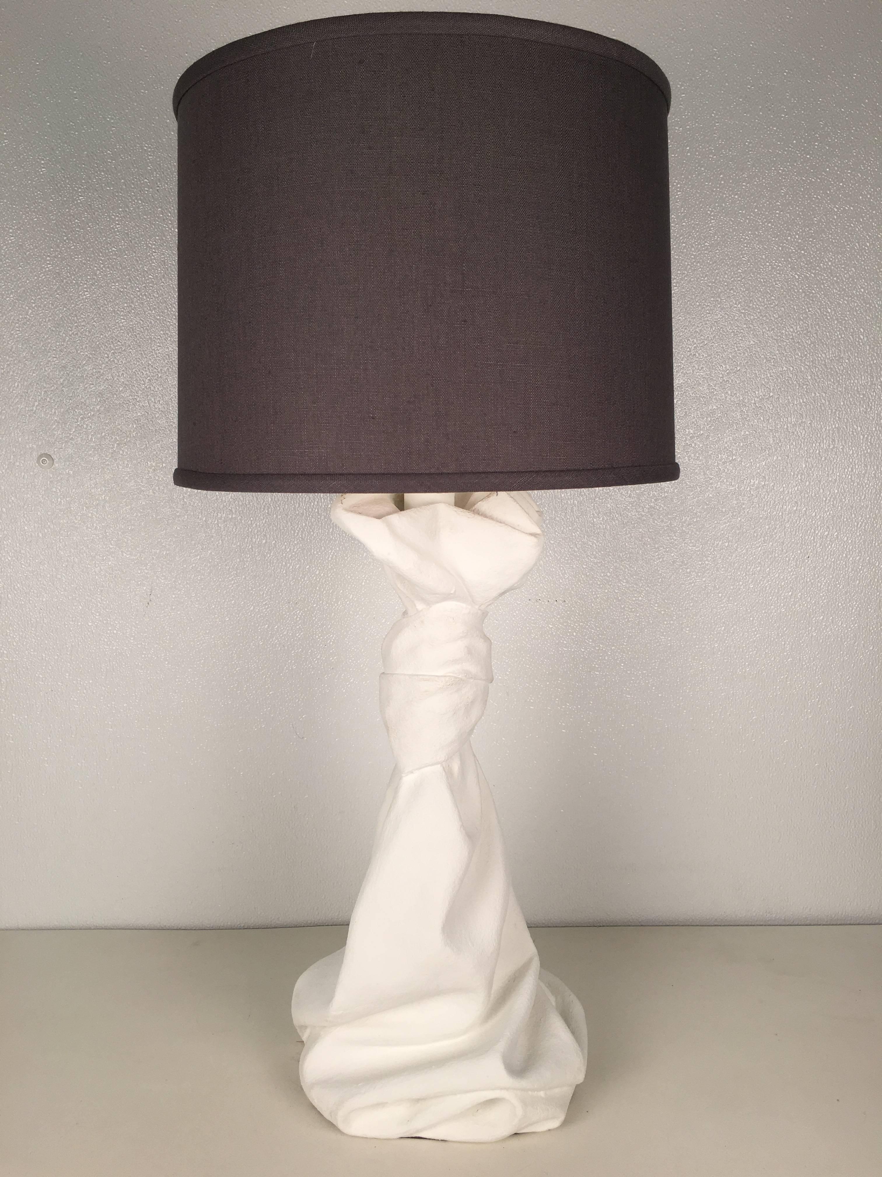 Pair of John Dickenson style draped plaster table lamps. Measures 23