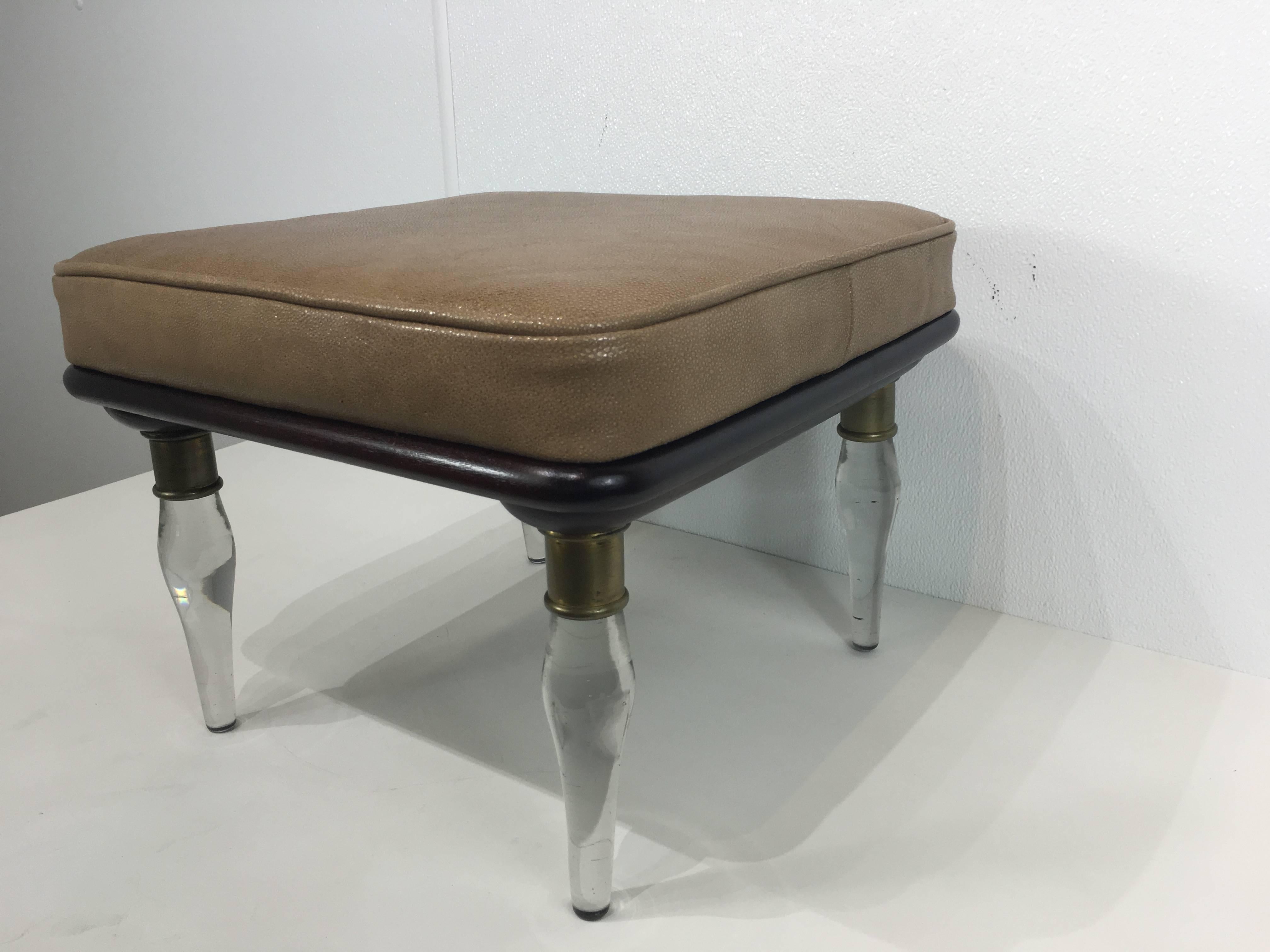 Murano glass foot stool of square form with newly upholstered leather cushion. Raised on four brass mounted clear Murano glass legs.
