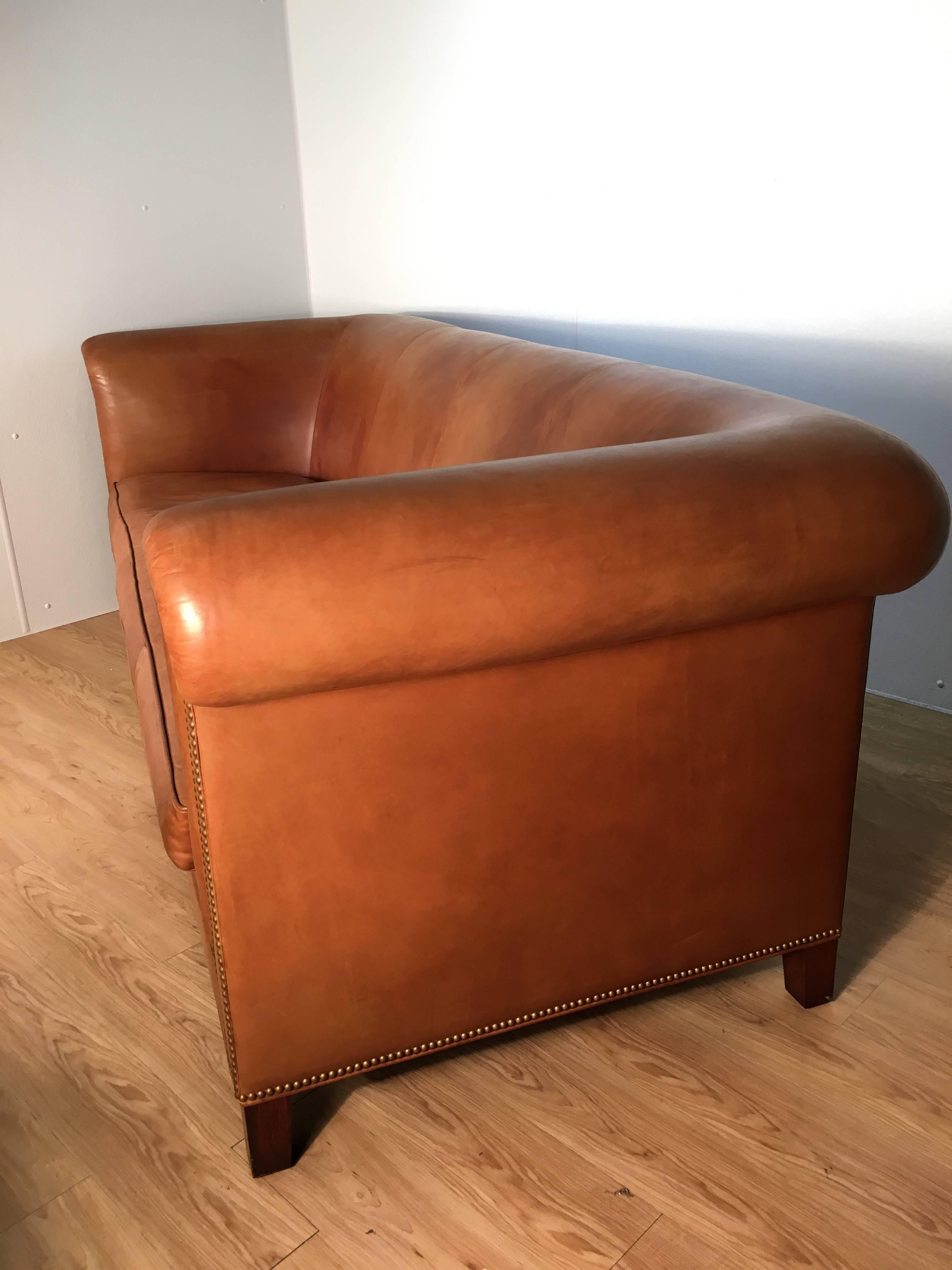 saddle arm sofa