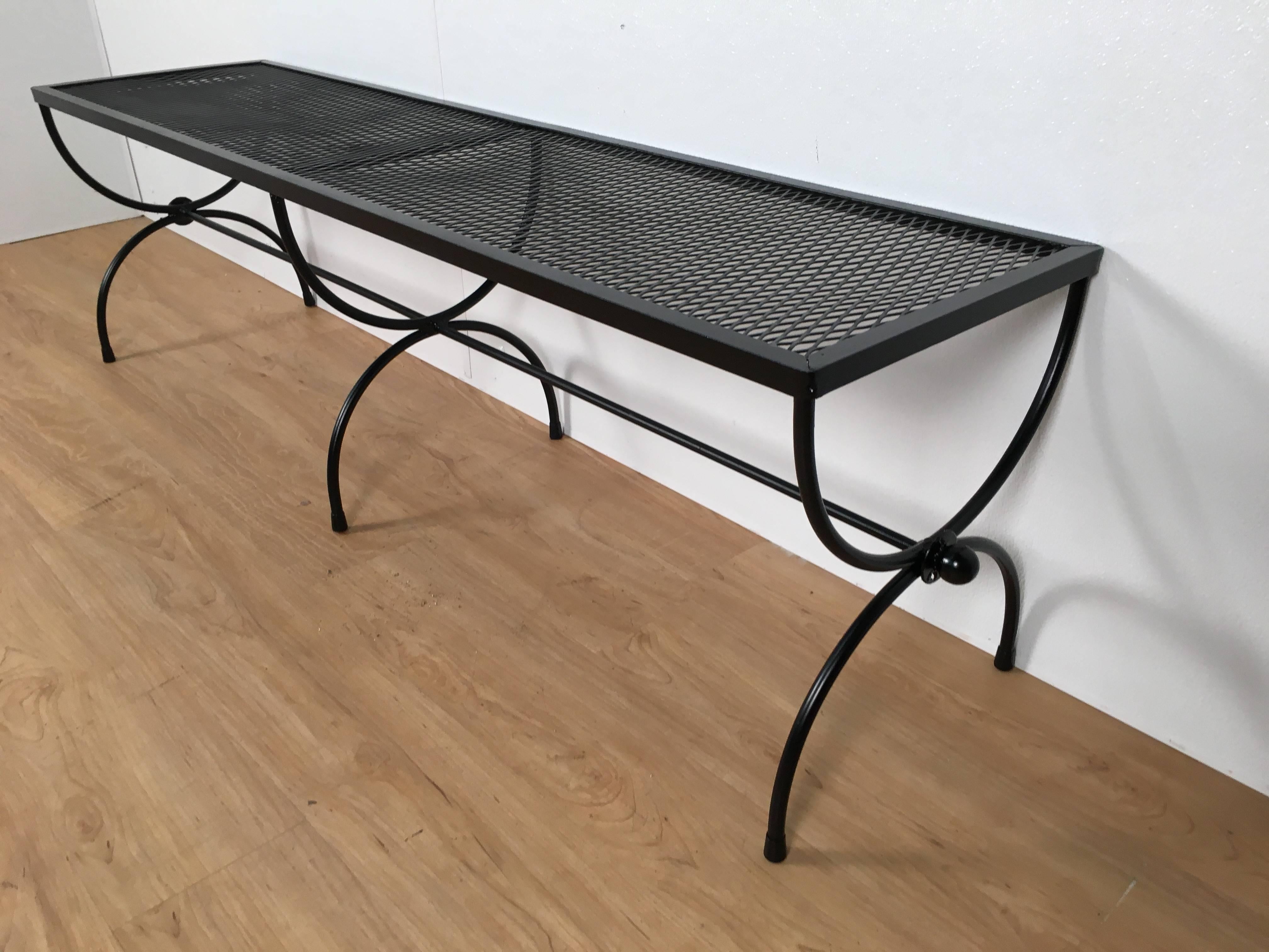 Long Salterini wrought iron Curule bench, great proportions and size.