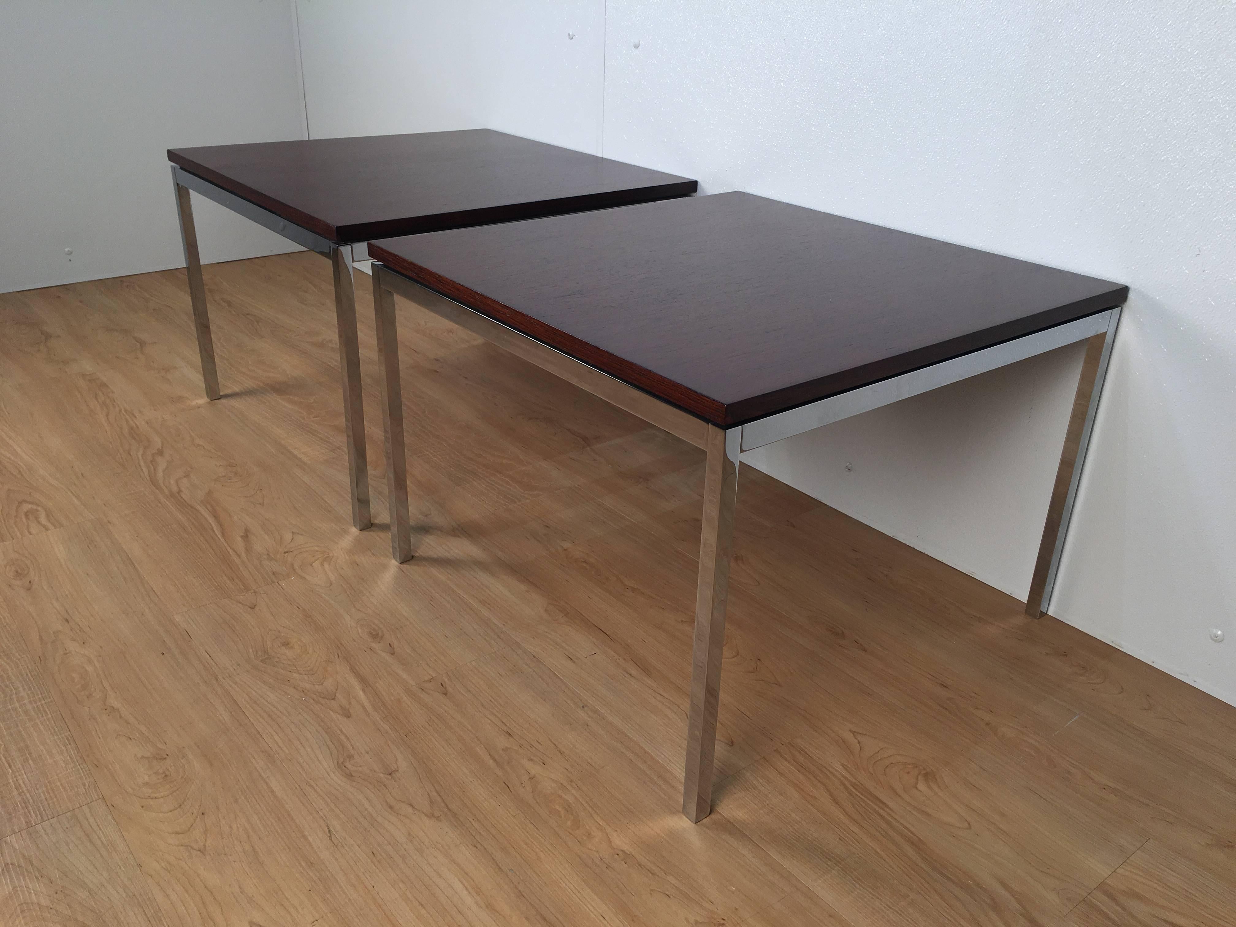 Pristine pair of Florence Knoll t-Angle side tables. Bright chrome base with rosewood top. Manufactured by Knoll International.