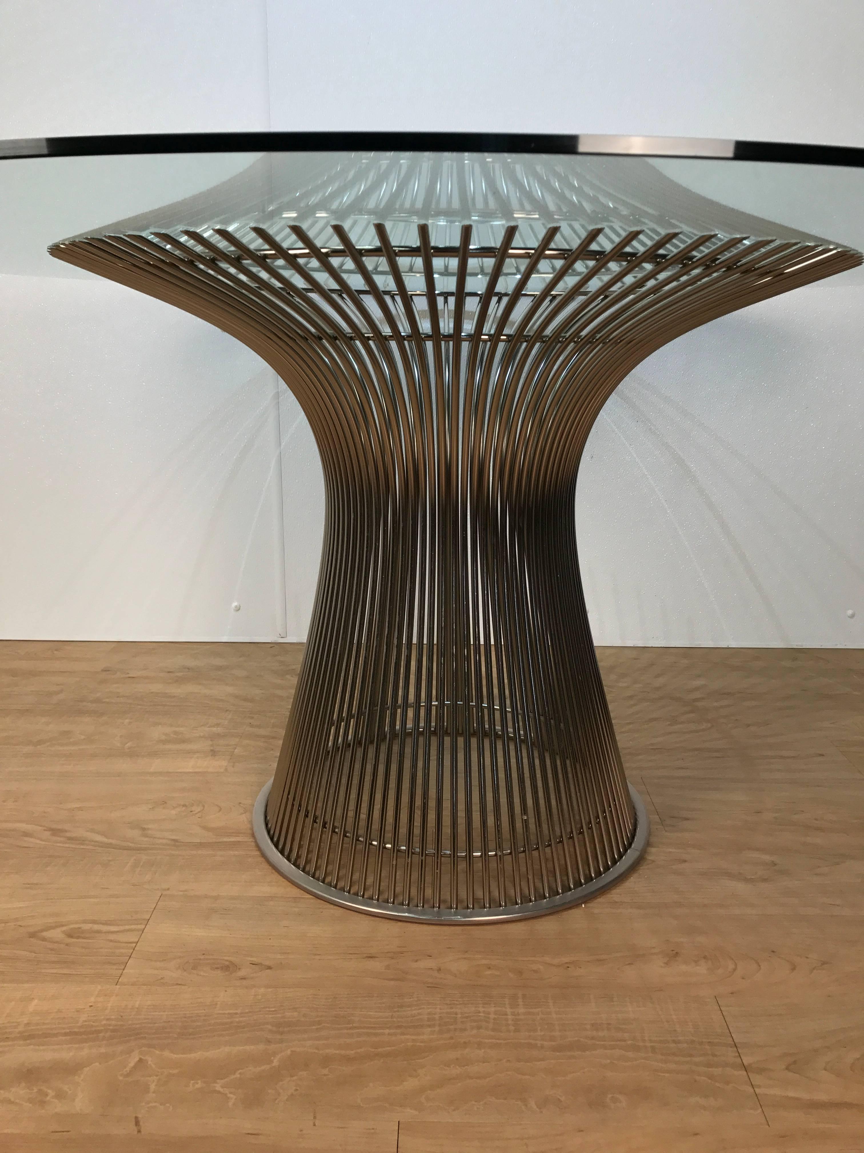 Warren Platner dining table, an excellent vintage example of the iconic form. With a new 48" flat polished edge circular glass top.