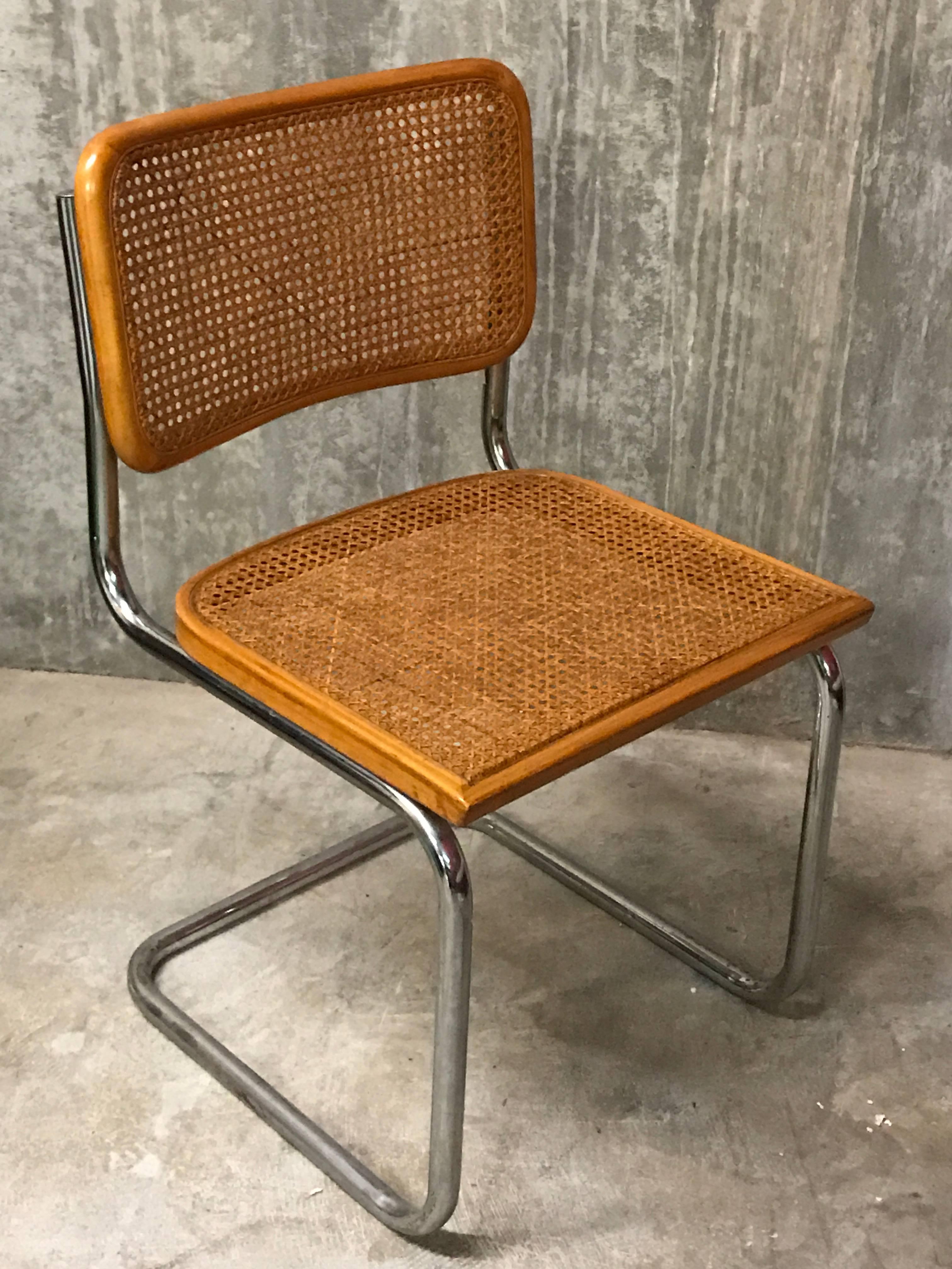 Six vintage Italian Cesca chairs, each one with rich honey yellow frames and firm caning, chrome in good vintage condition, some with made in Italy labels.