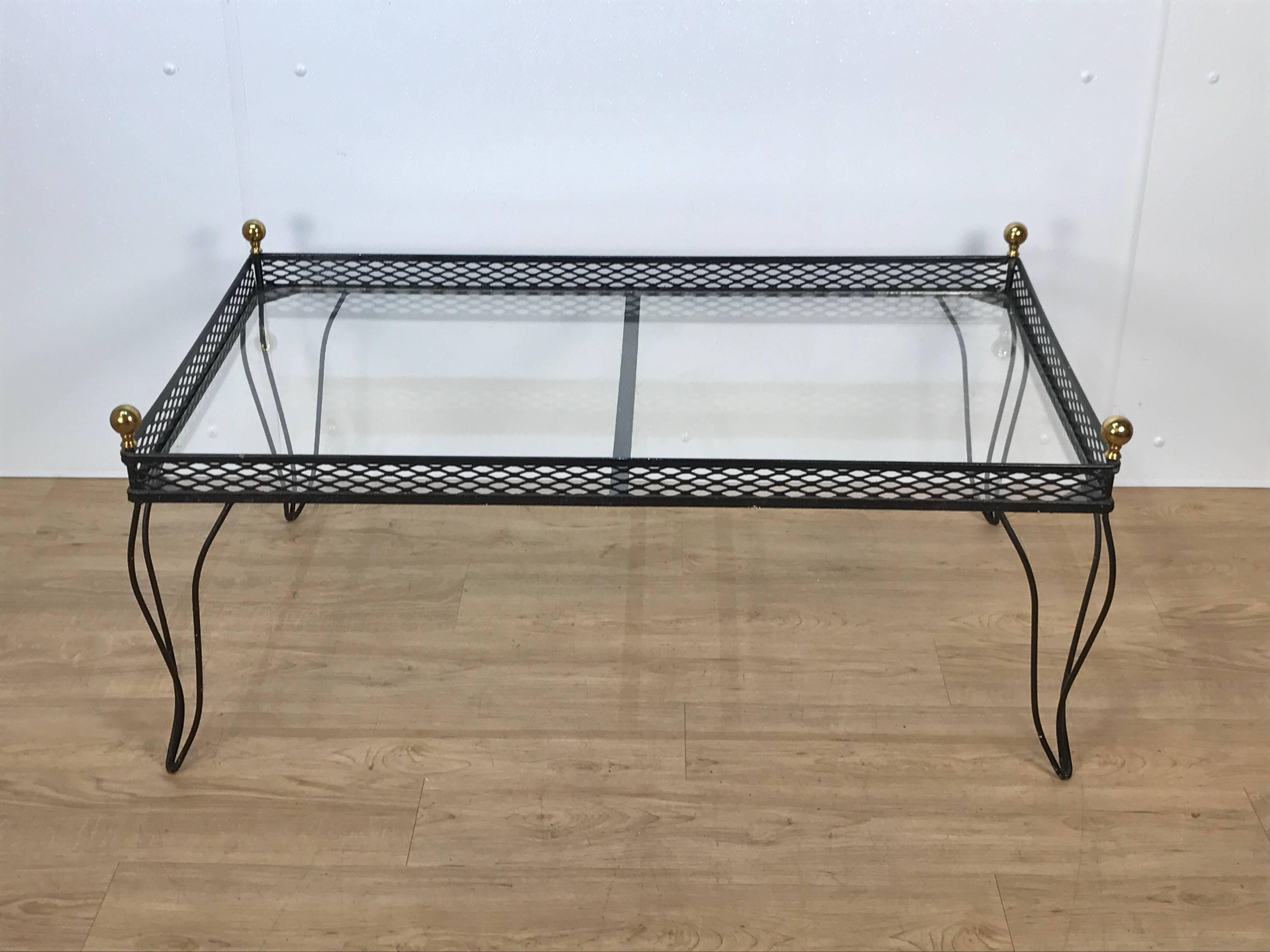 Royère style Salterini coffee table, of rectangular form with four brass orbs at each corner, reticulated gallery edge with removable inset clear glass top, raised on four wire work cabriole legs. Can be used indoors or outdoors.