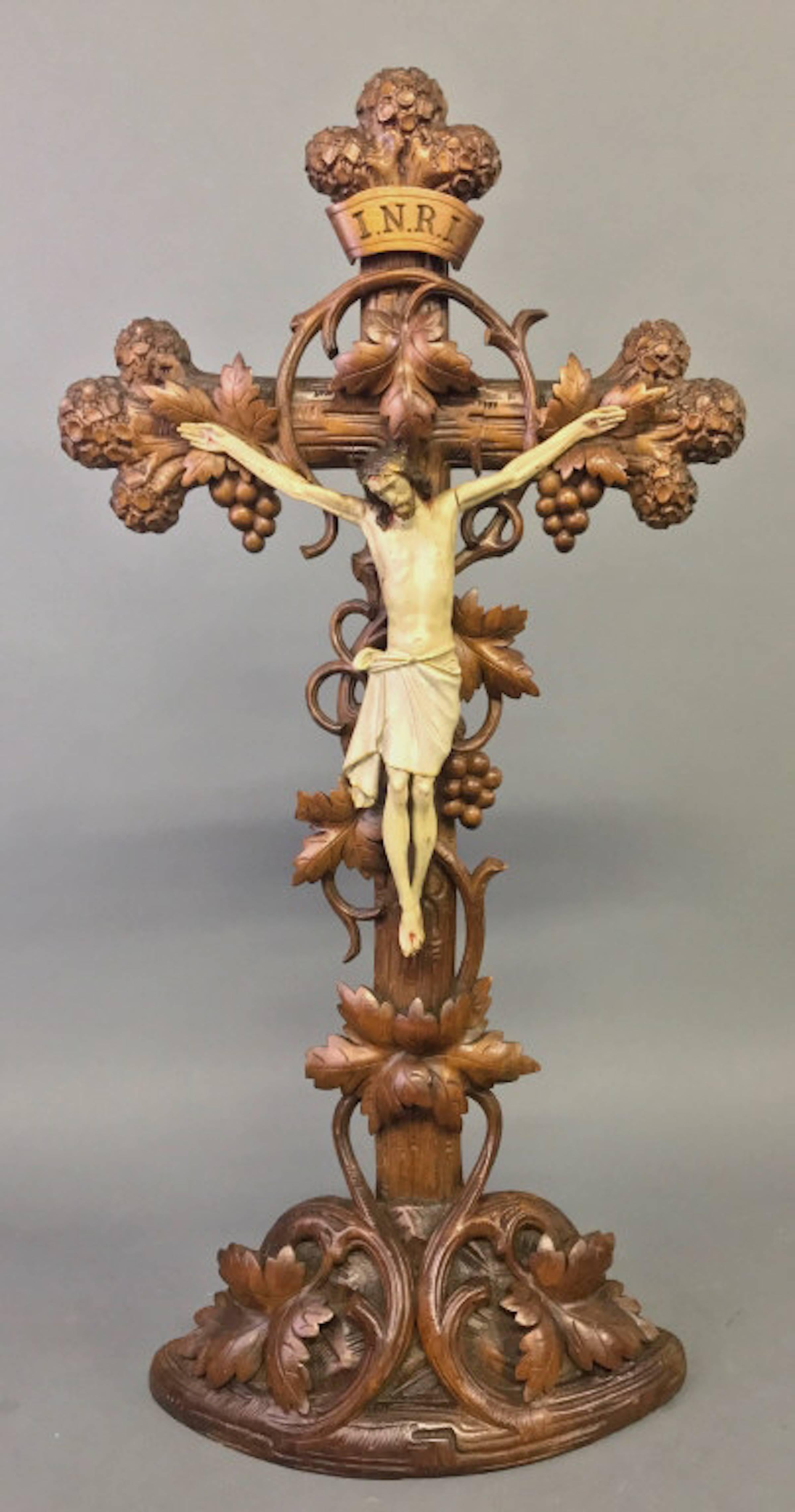 European highly carved walnut altar crucifix.