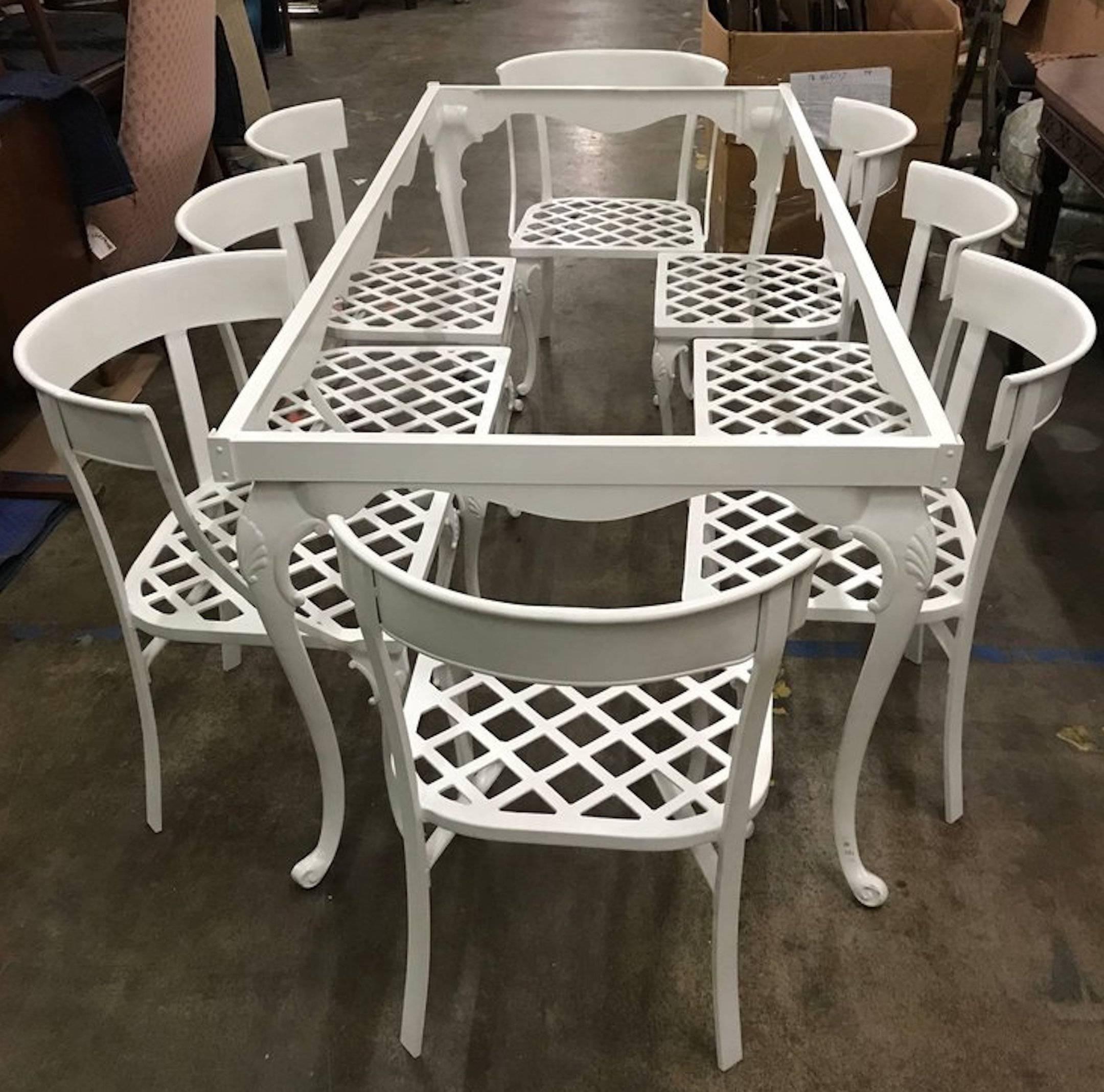 Klismos Patio set for eight, in the style of Billy Haines, restored
Newly enameled white cast aluminium
Consisting of:
Measure: One 72