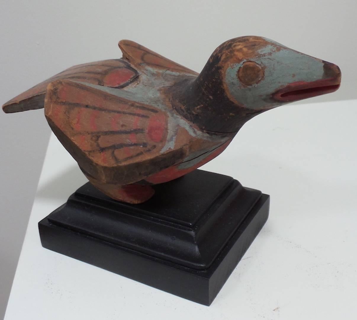 carved wood raven