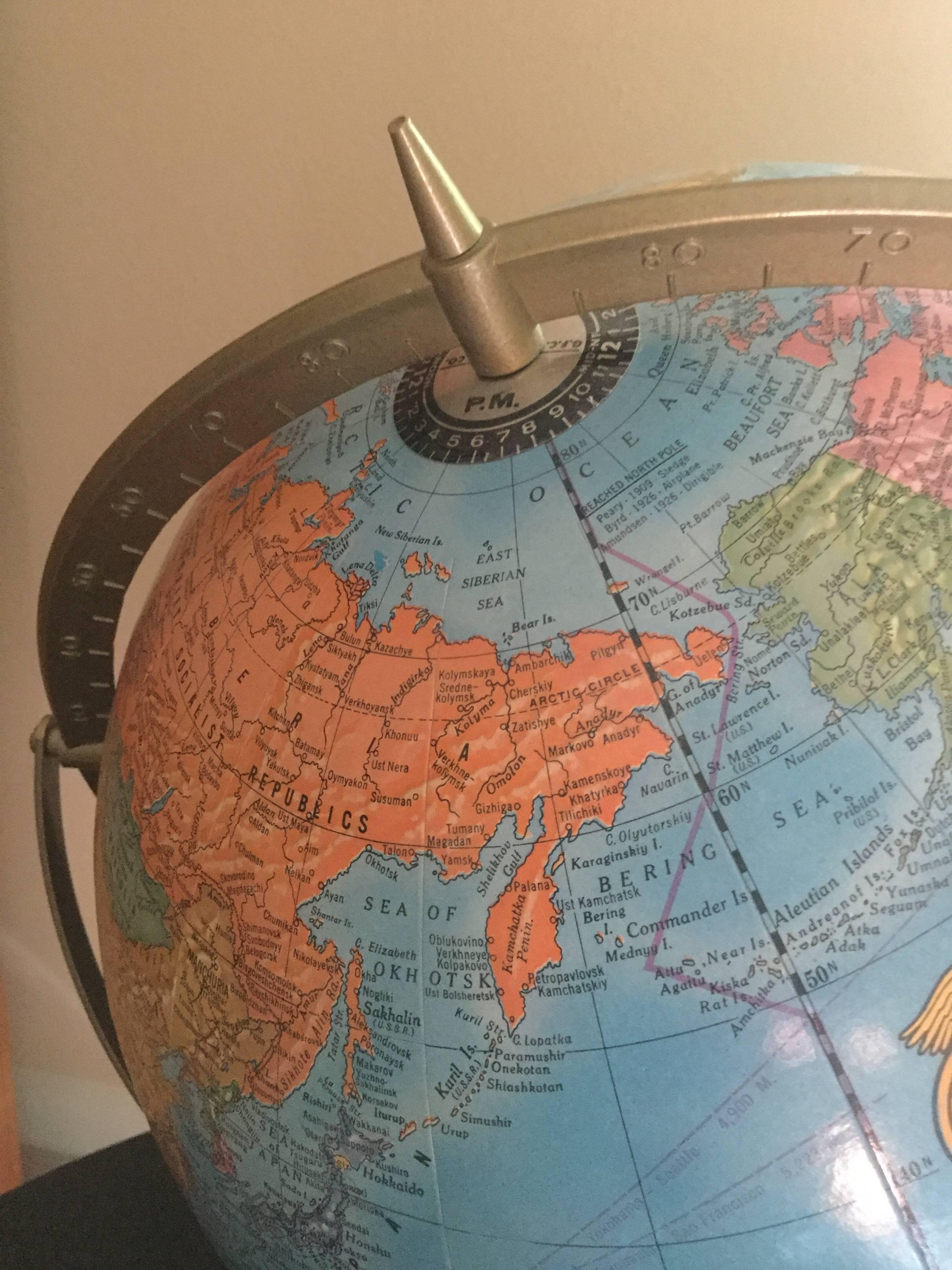 Vintage brightly colored rotating globe. Excellent condition.