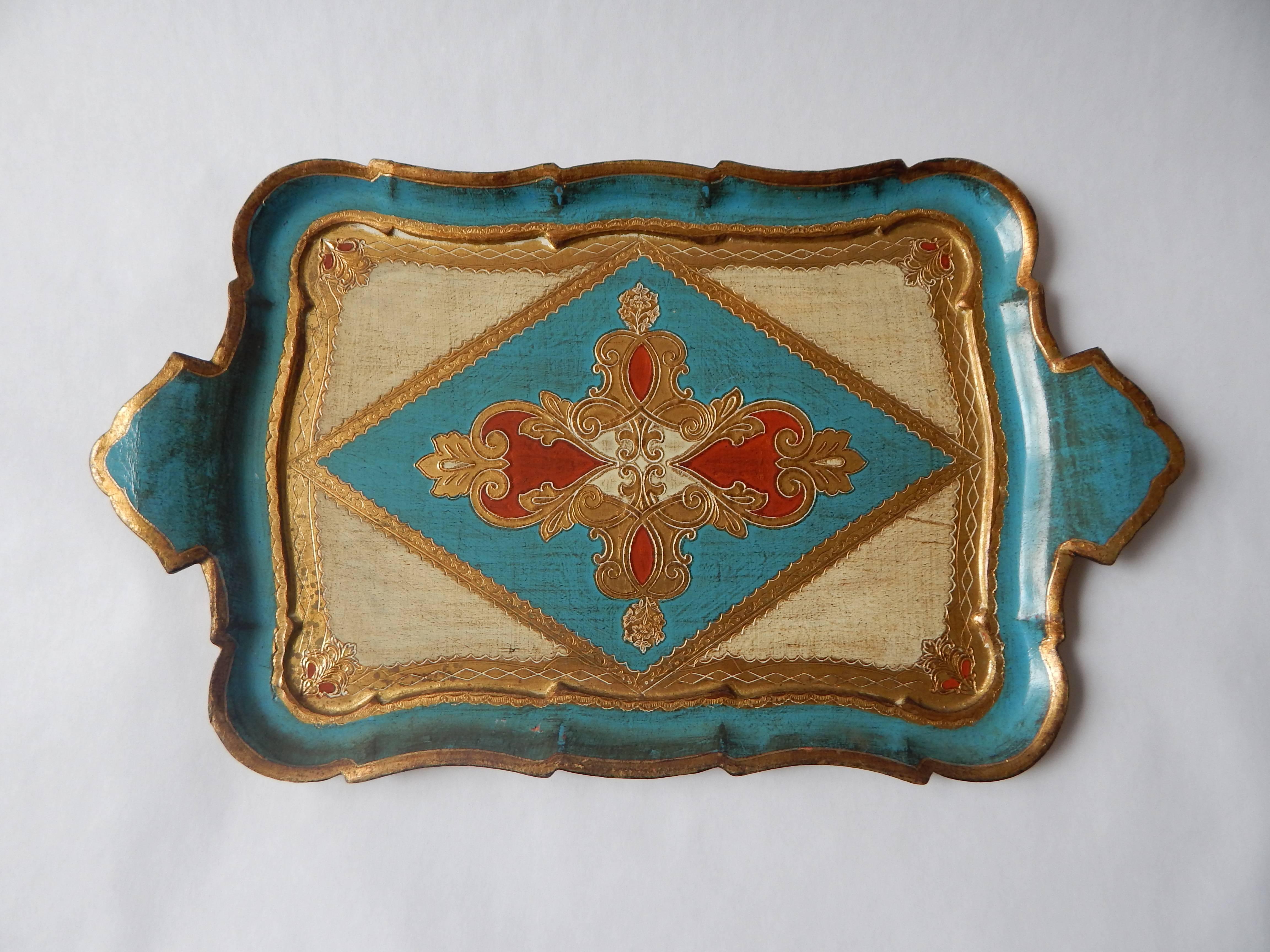 Two markings, florence, made in Italy. Made by Gabbinni, Florence, Italy. Gilded painted tray.