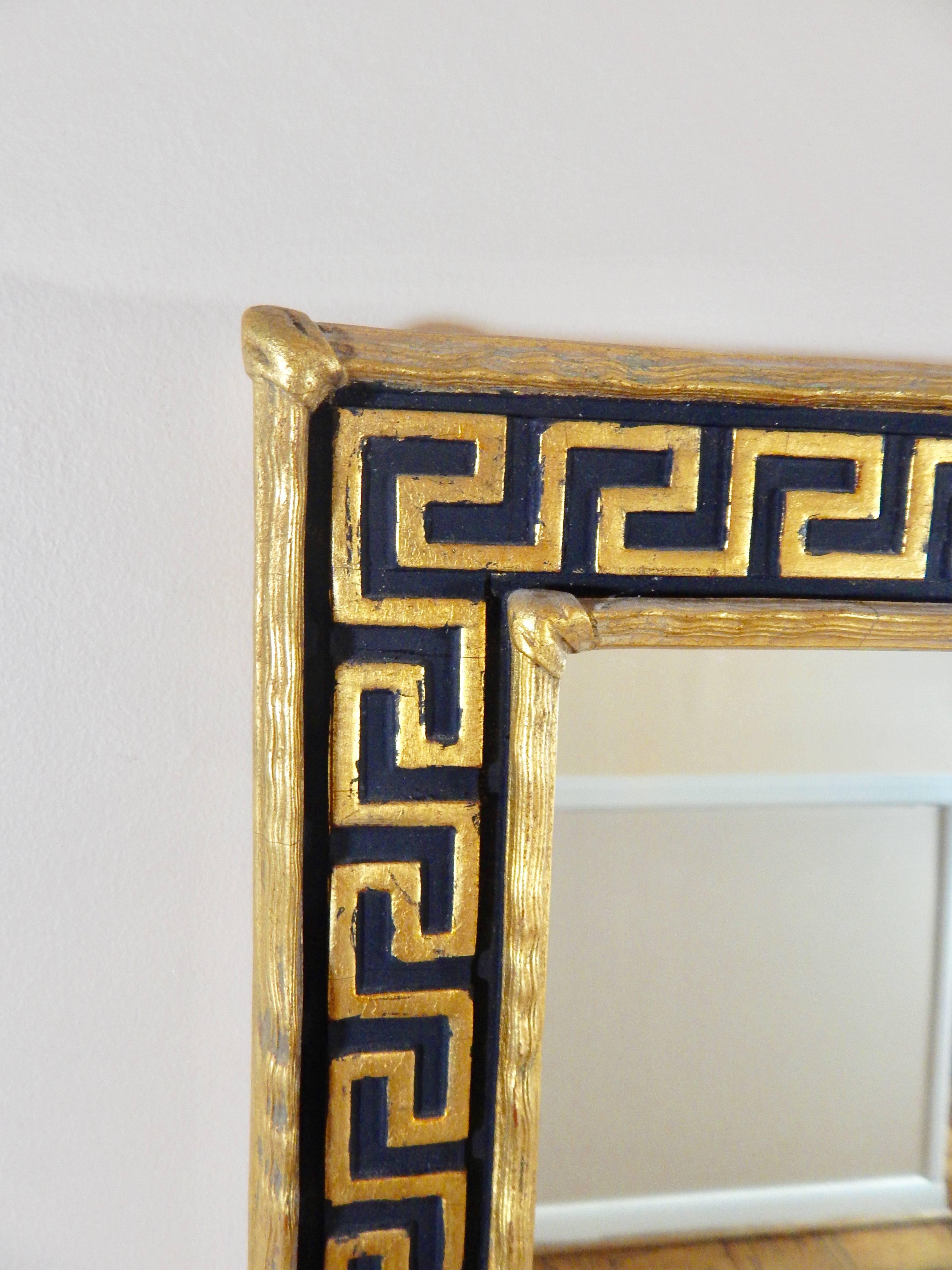 1960s Mid-Century giltleaf and black Greek Key mirror. Excellent condition.

We offer Complimentary shipping for this item in NYC and surrounding areas as well as some Mid Atlantic Areas. 