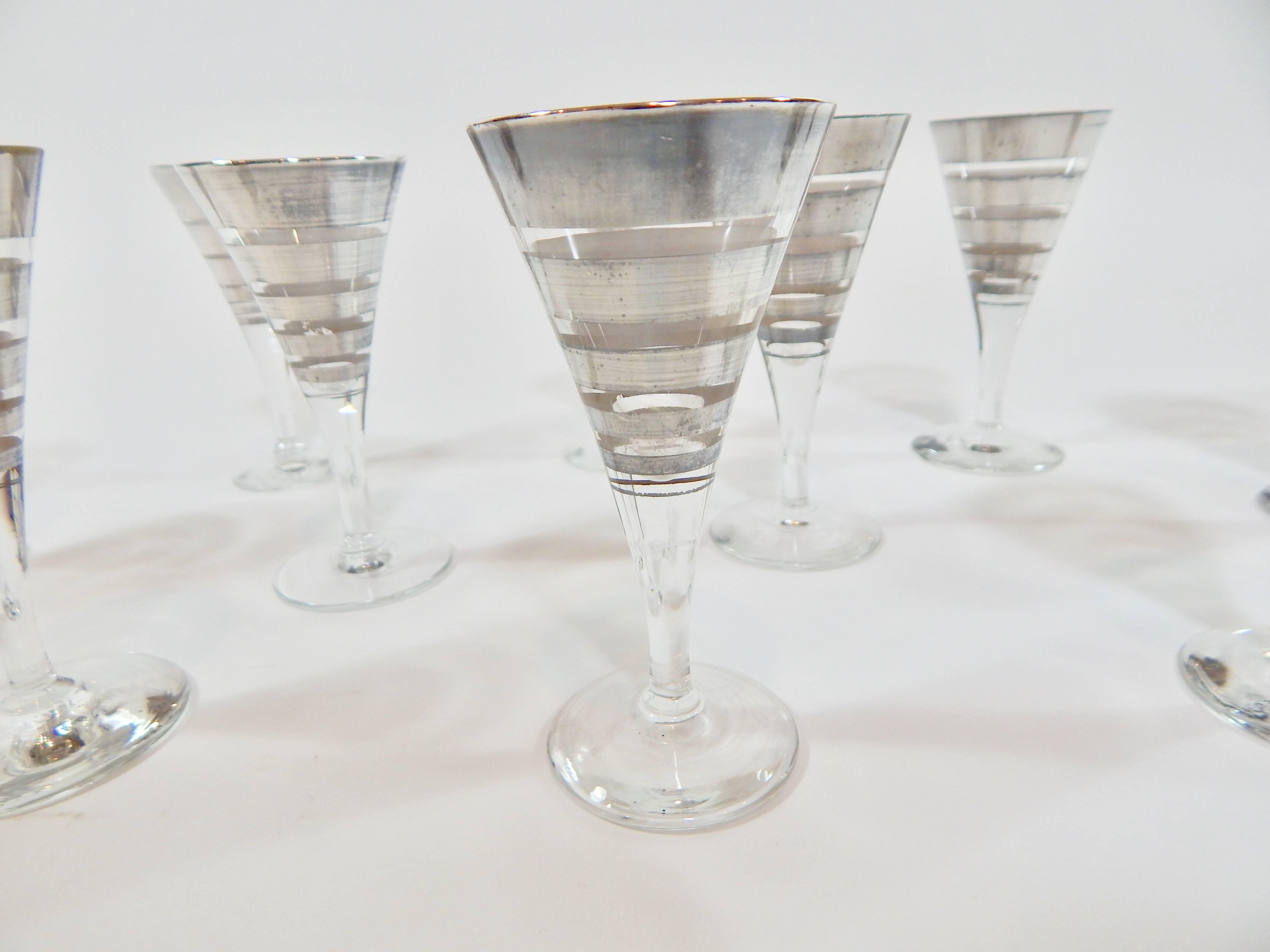 Authentic 1950s Mid-Century set of ten Dorothy Thorpe cordial glasses or cocktail flutes with stem. Rare design. All marked and signed with signature T on bottom. Perfect addition to any bar or table setting. Glass in excellent condition. Exhibits