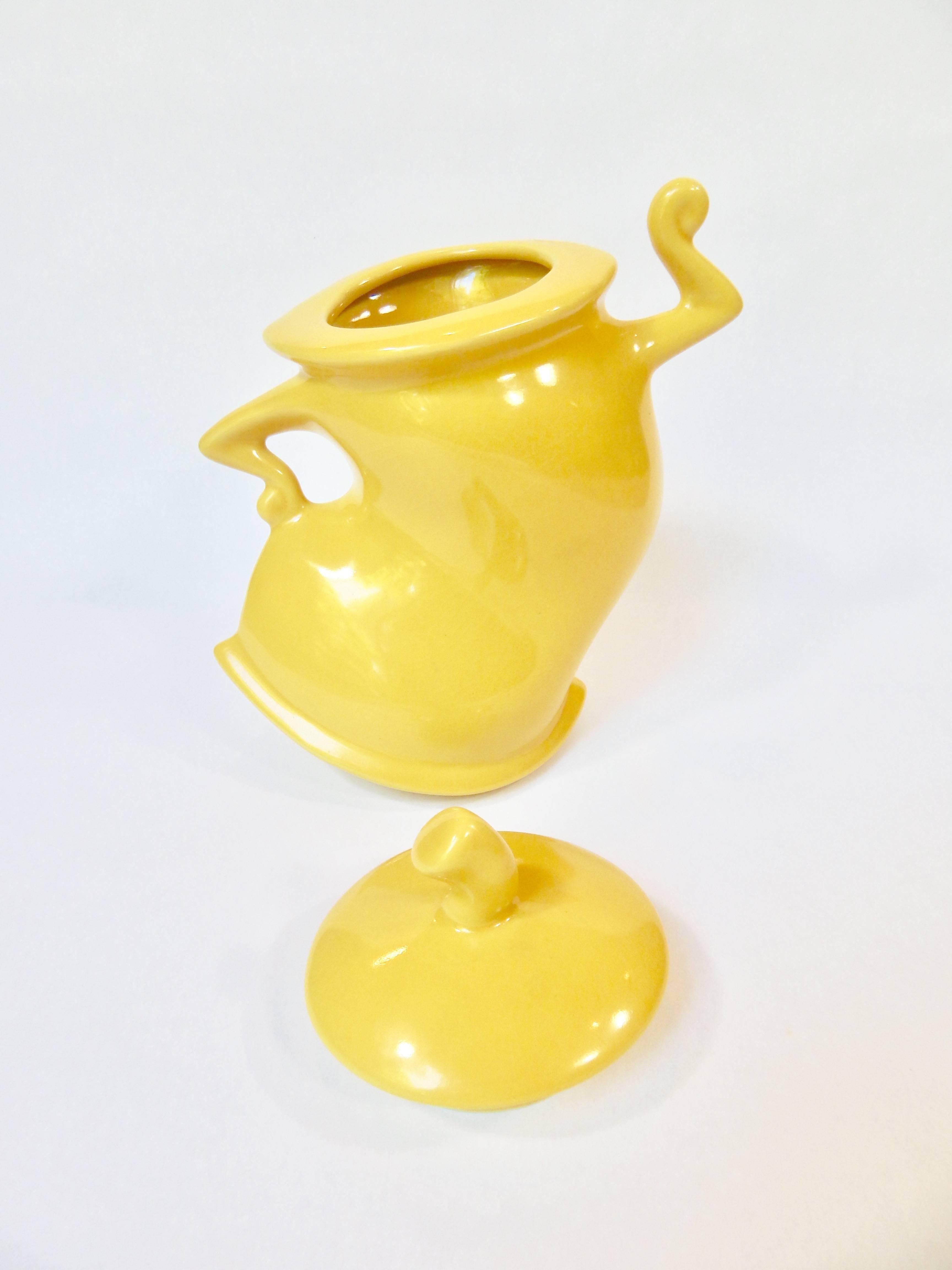 Artist signed Michael Lambert fun yellow sculptural figural glazed ceramic jar with lid, circa 1980s. Excellent Condition.