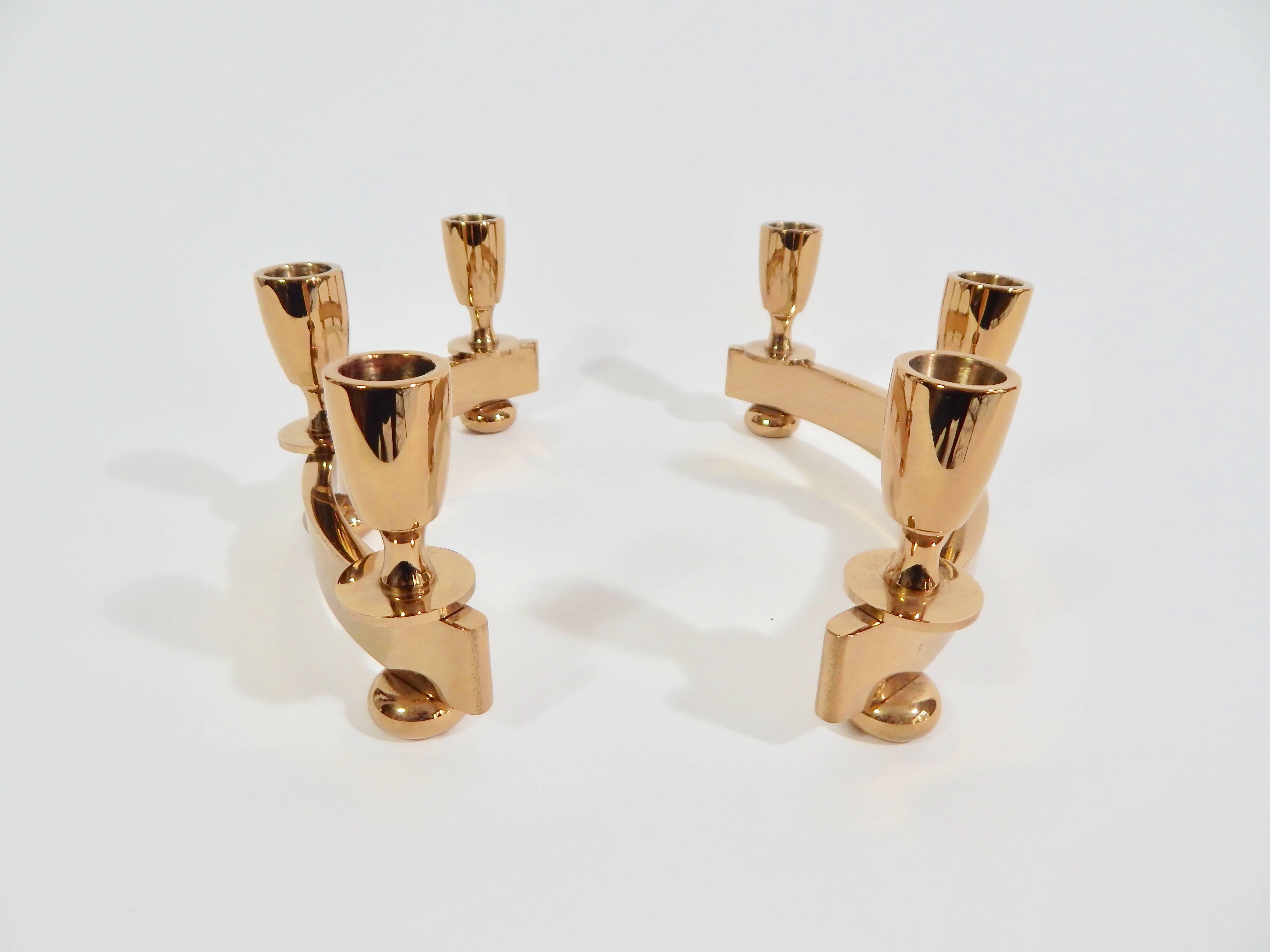 Gorgous pair of Mid Century Art Deco inspired solid brass candlesticks or candelabras.