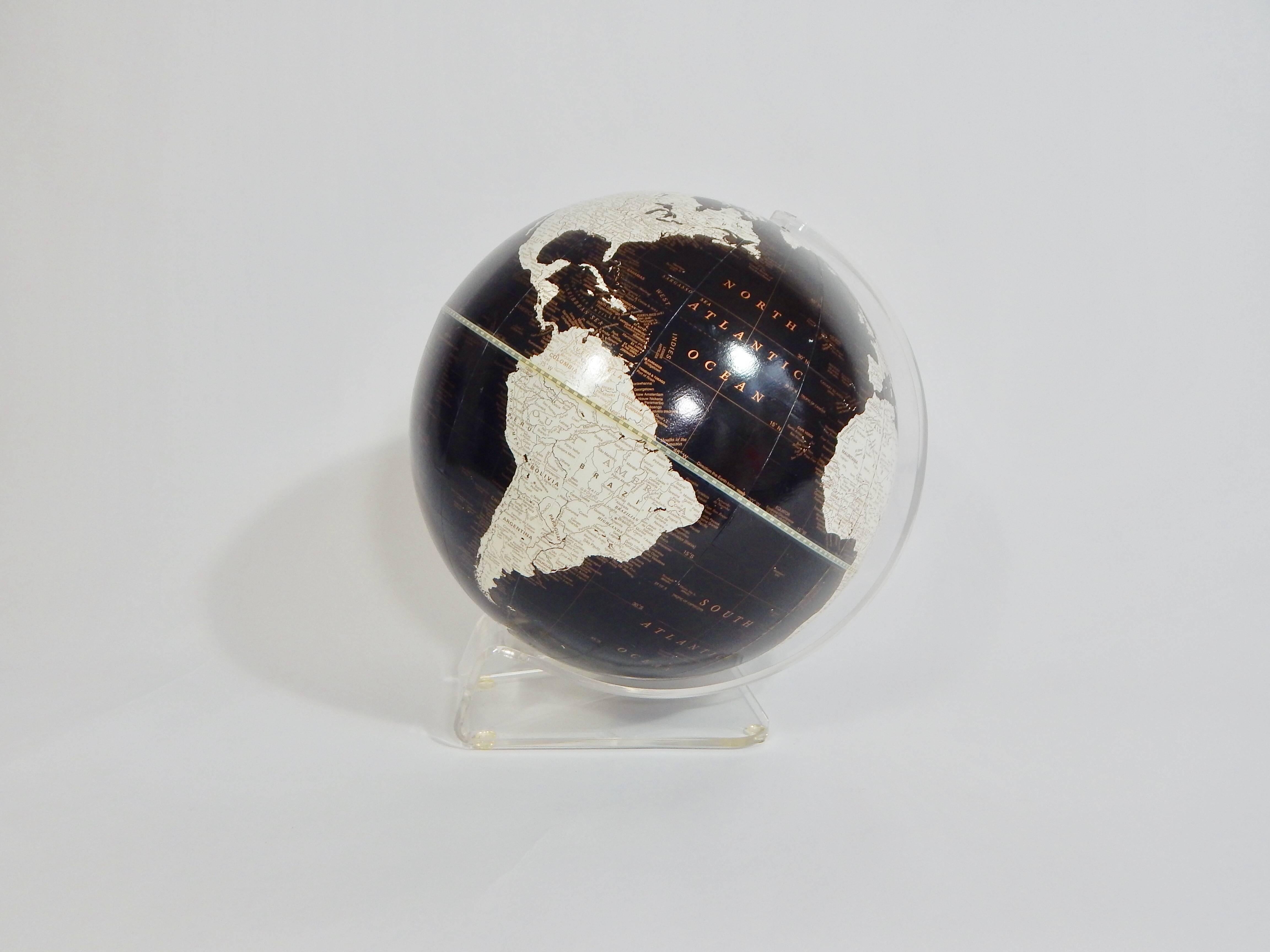 1970s black and white Cram's globe with Lucite stand. Imperial globe by George F Cram Company. Unique chic black and white with hint of gold accents.
Excellent condition.