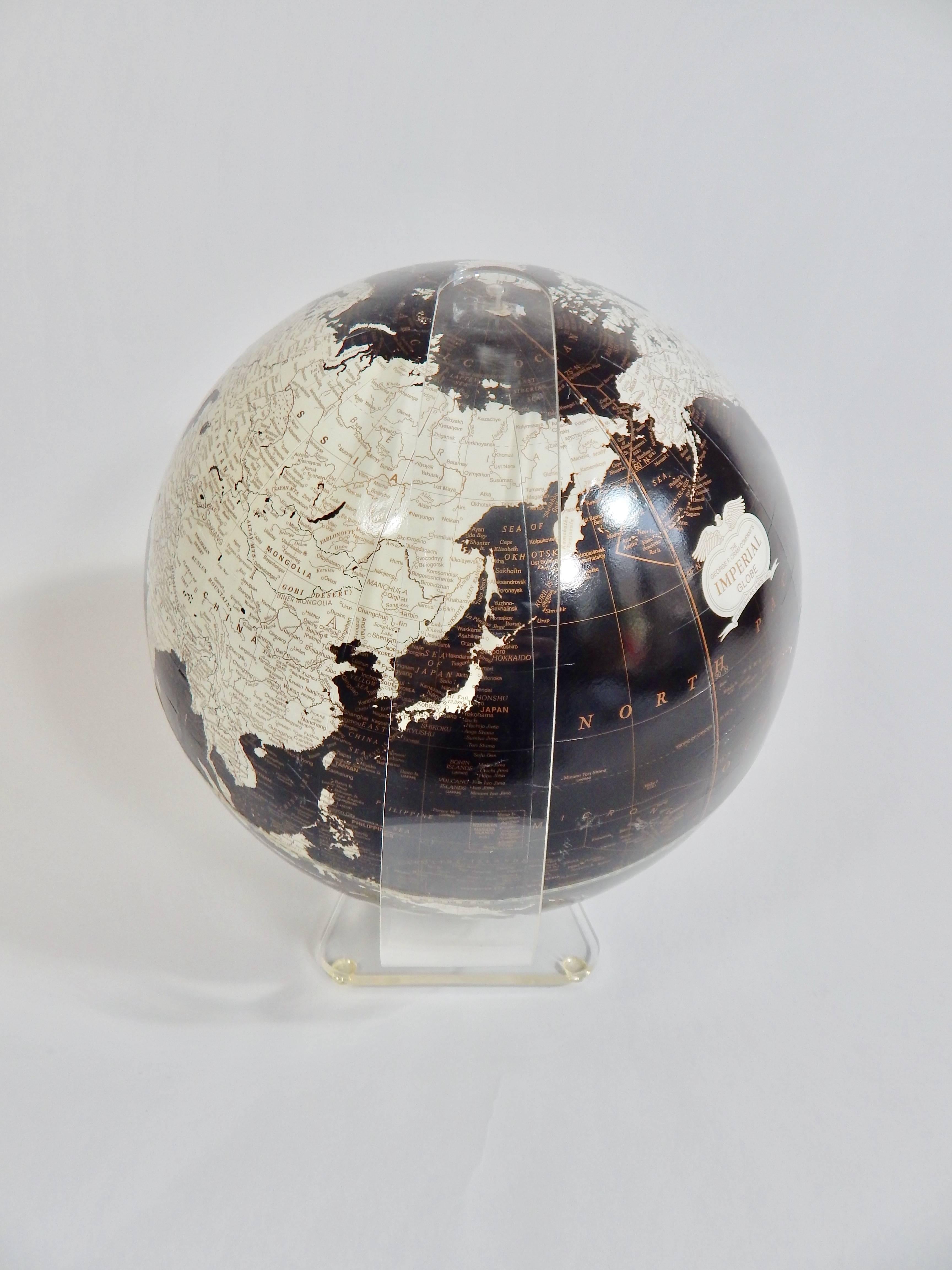 Mid-Century Modern 1970s Black and White Globe with Lucite Stand by George F. Cram