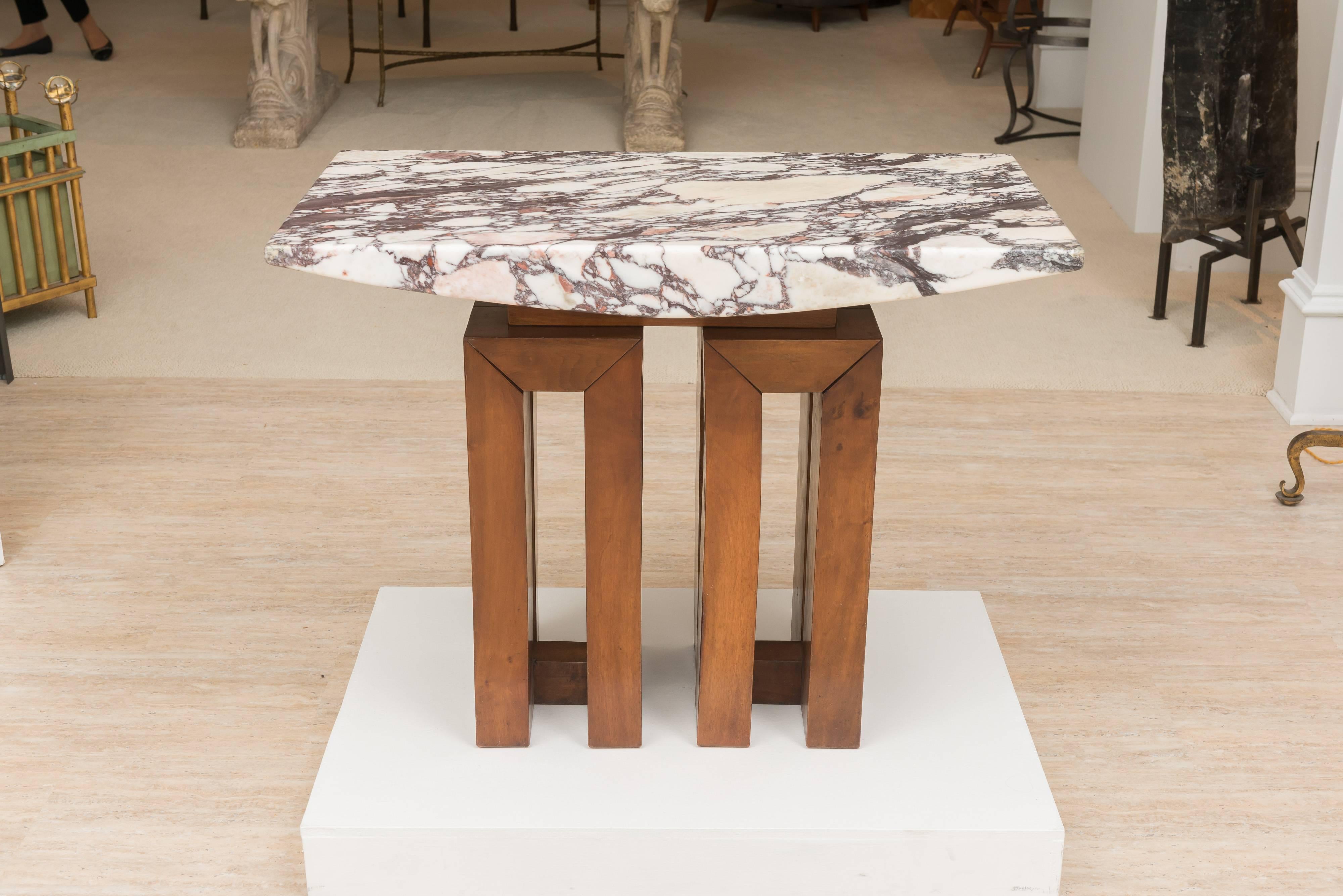 Rare Brescia marble and walnut base center table by the Italian architect Pierluigi Spadolini,
Florence, circa 1962.