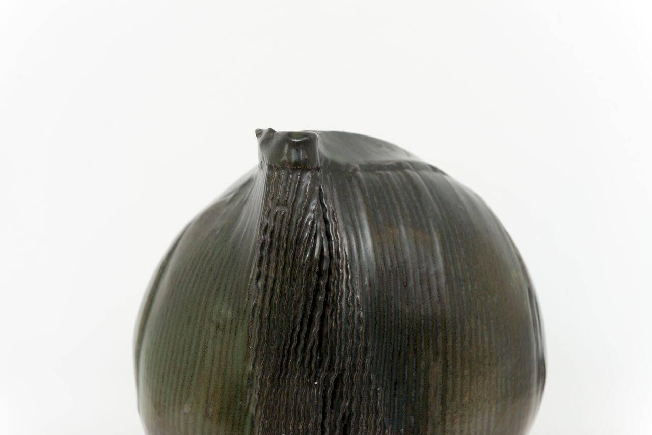 Dark green organic-form ceramic vase by Sassi Milici.
Signed underside.
Vallauris, France, circa 1970.