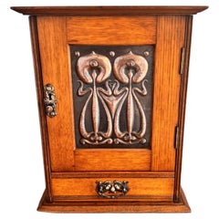Antique art nouveau golden oak smokers cabinet