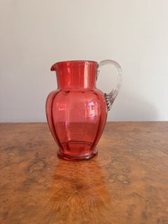 Pretty antique Victorian cranberry glass jug