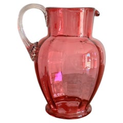 Pretty antique Victorian cranberry glass jug