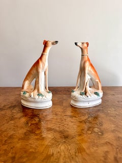 Fine quality pair of antique Victorian Staffordshire greyhounds