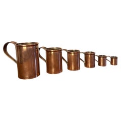 Fantastic quality set of six antique Victorian copper measurers