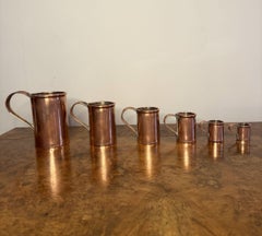 Fantastic quality set of six antique Victorian copper measurers