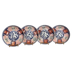Wonderful quality set of four antique Japanese imari small plates