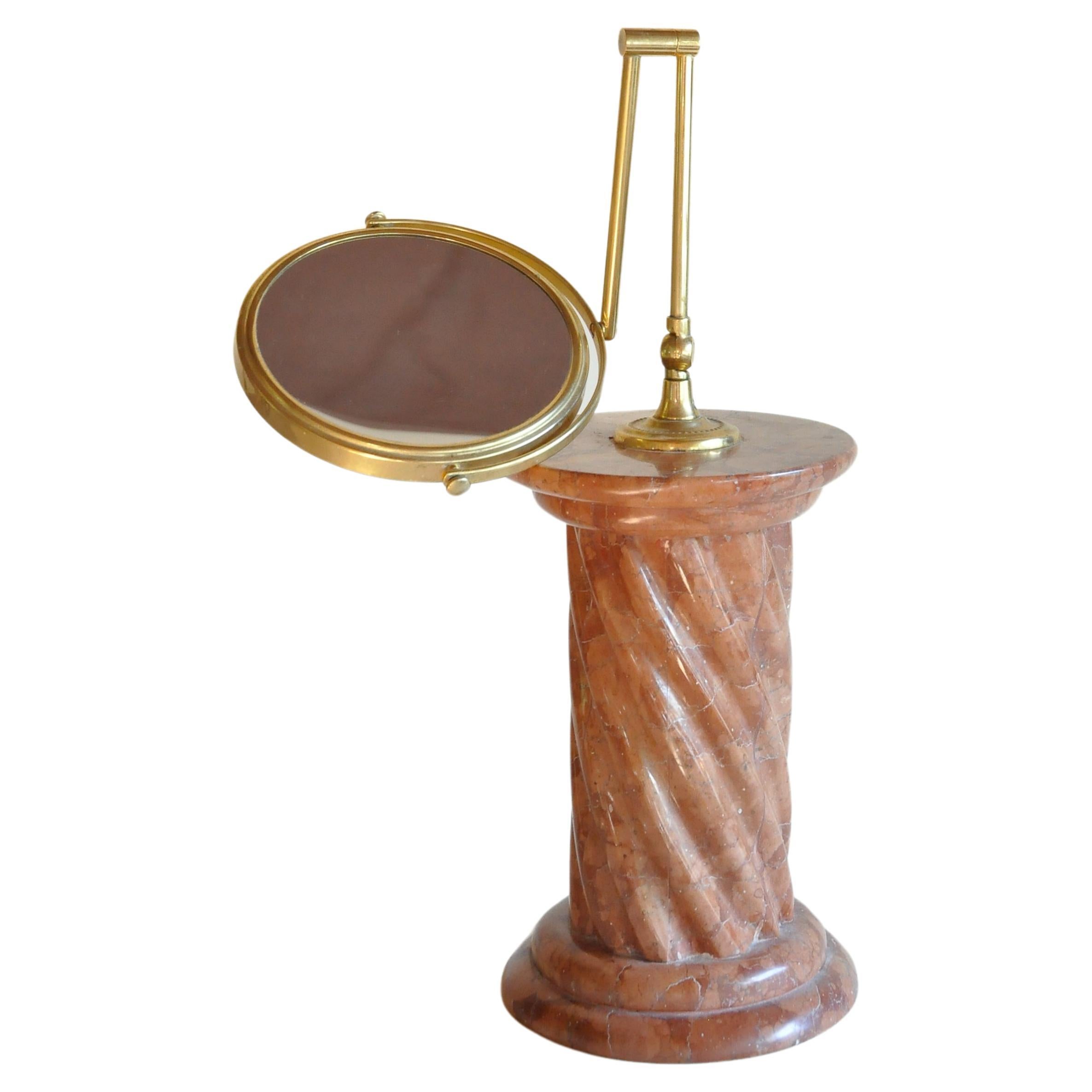 Brass Vanity Mirror on Monumental Rust Marble Pillar Base For Sale