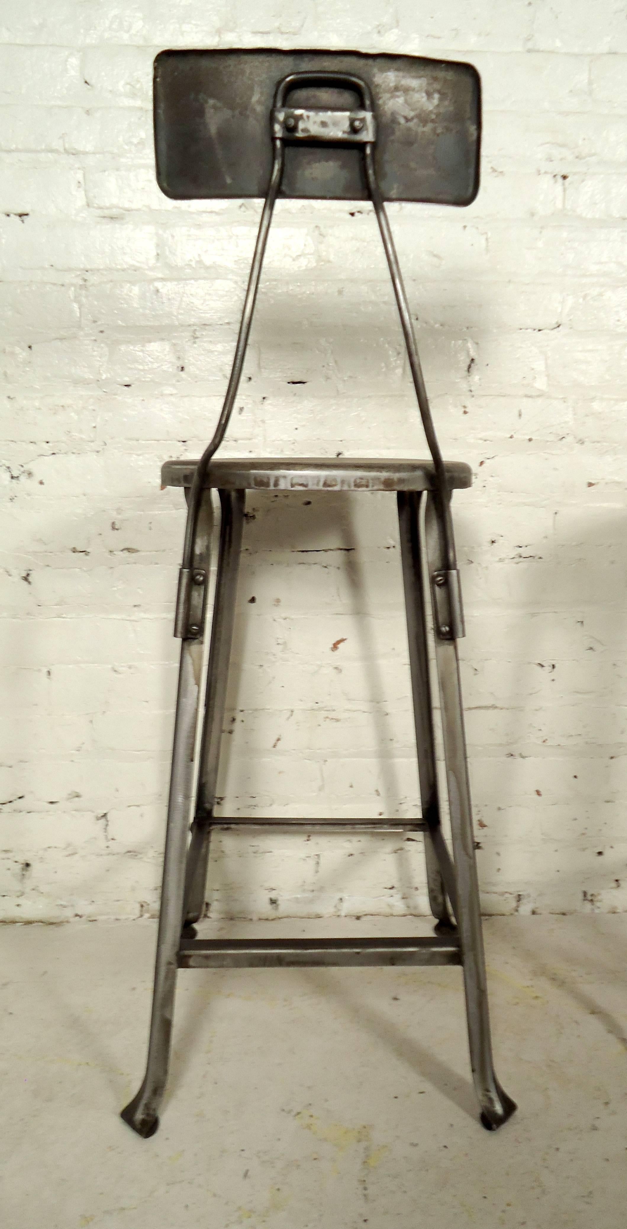 Pair of Toledo Style Industrial Factory Stools In Distressed Condition In Brooklyn, NY