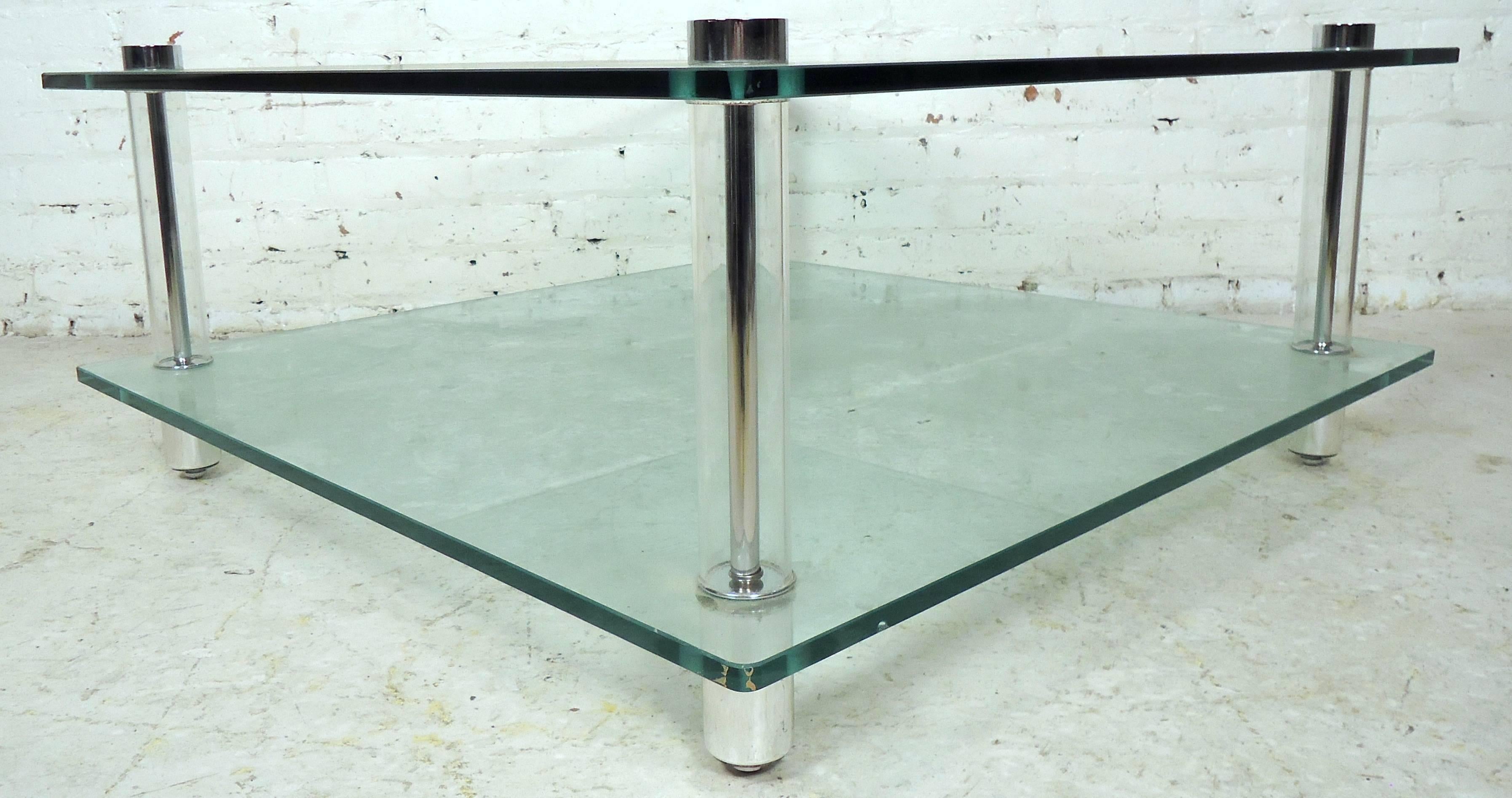 Vintage modern two-tier coffee table featuring heavy glass with chrome capped Lucite legs.

Please confirm item location NY or NJ with dealer.