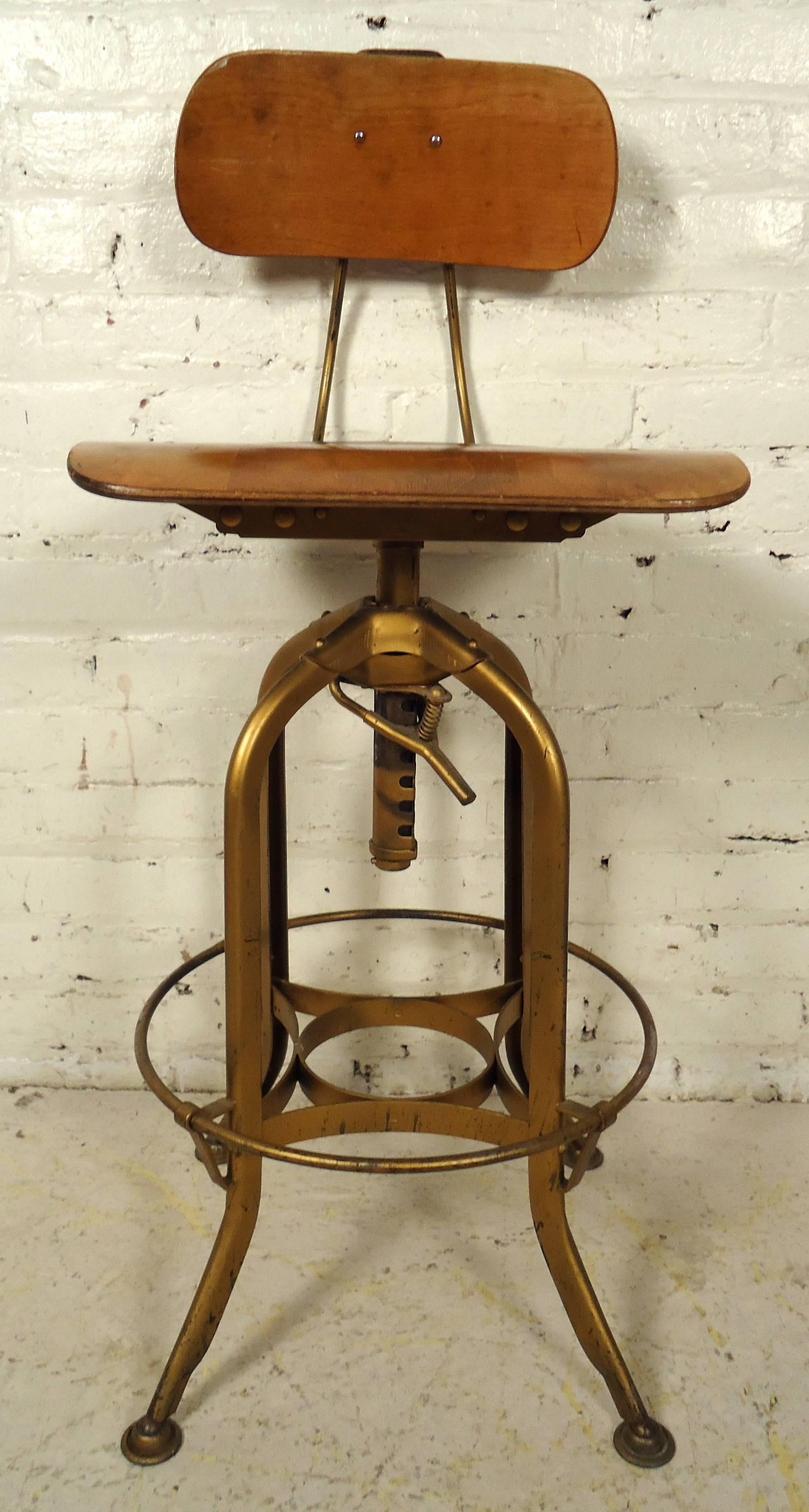 Vintage-modern Toledo stool featuring sturdy and adjustable metal base with bentwood seat and back.

Adjusted height 25 - 37.

Please confirm item location NY or NJ with dealer.