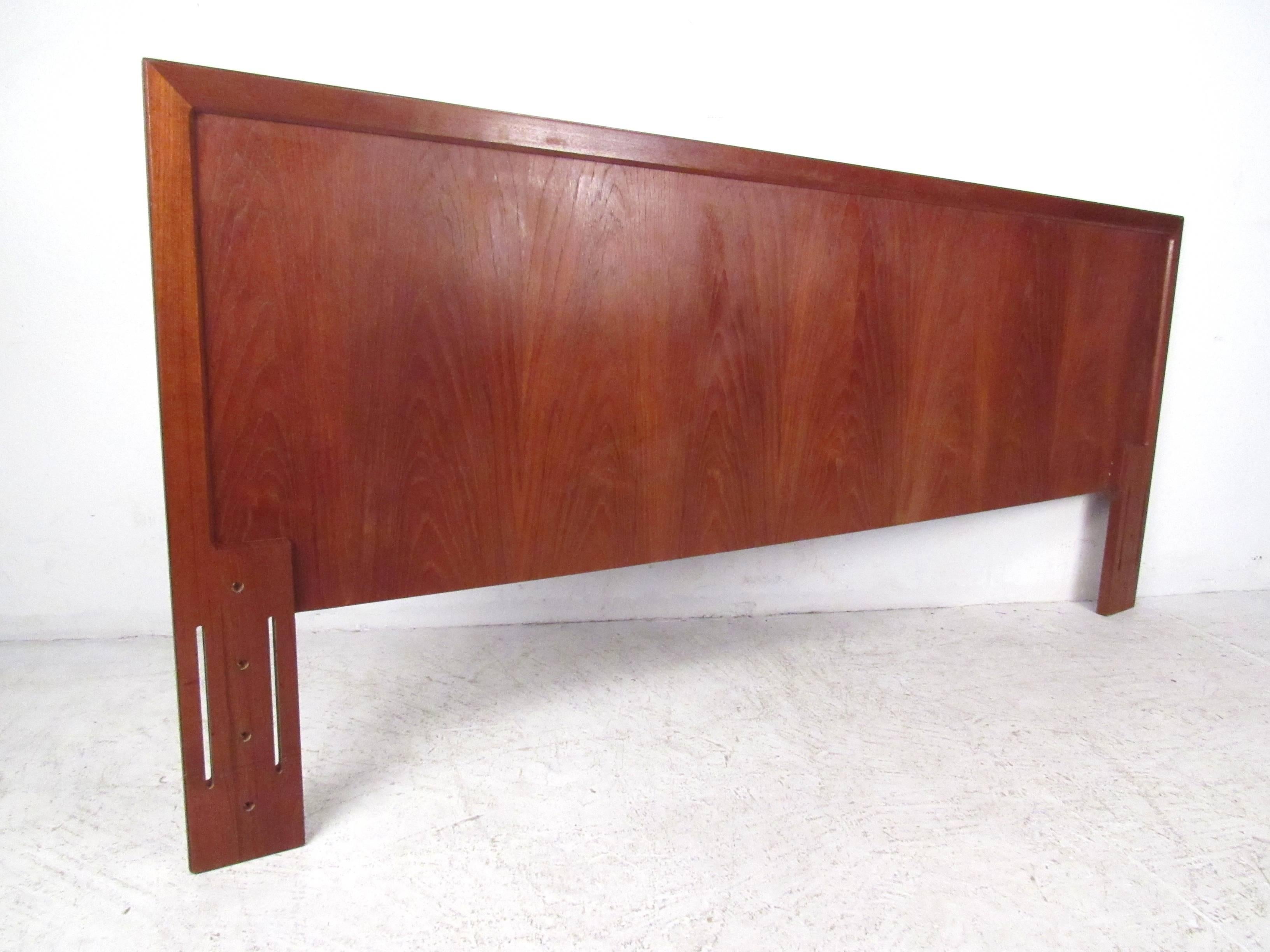 This vintage teak headboard measures 78 inches wide and makes a beautiful vintage addition to any Mid-Century style bedroom. Please confirm item location (NY or NJ).