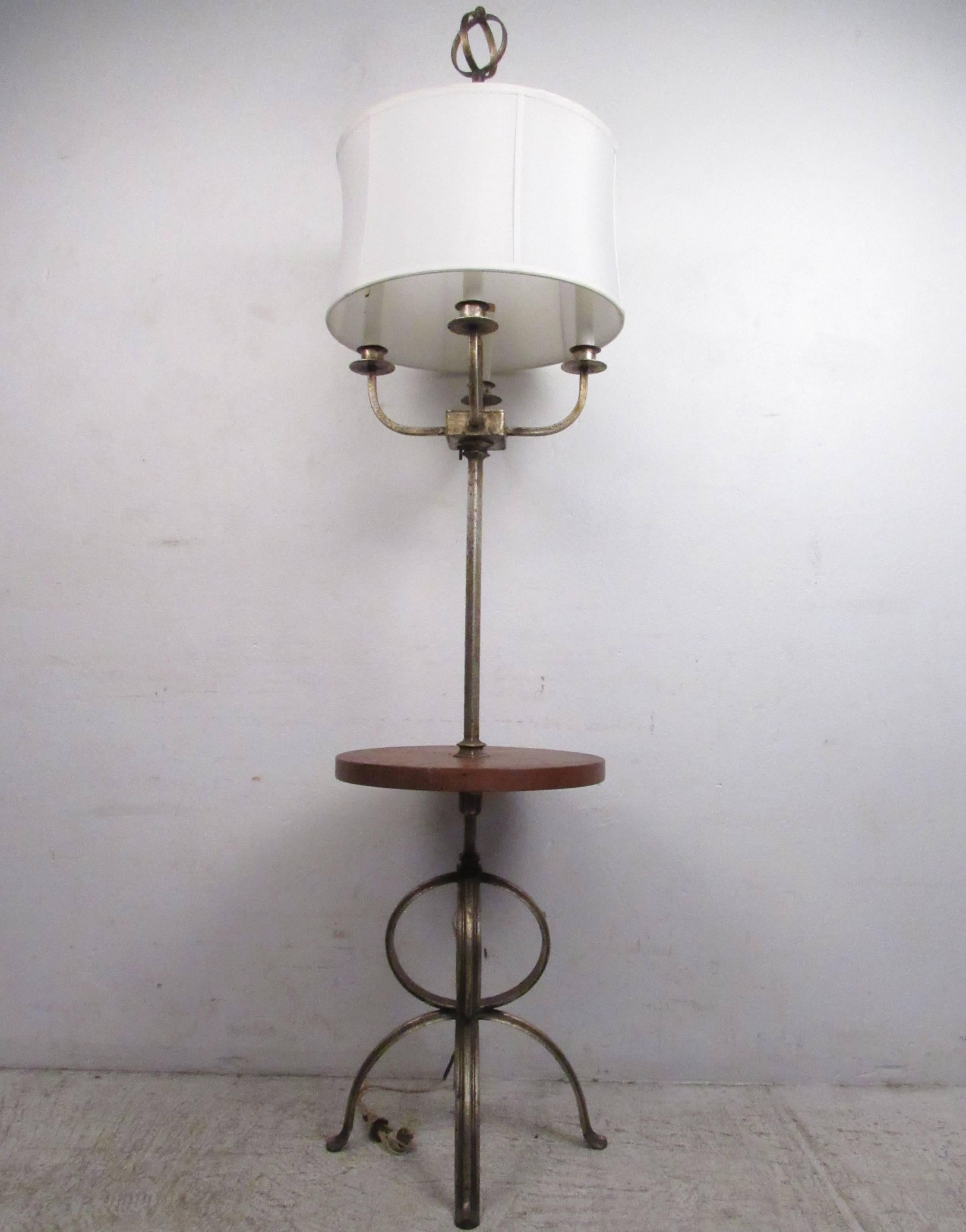 This unique vintage candelabra style lamp features sturdy metal construction and a unique wooden table top. Vintage finish is complimented by original design details. Please confirm item location (NY or NJ).