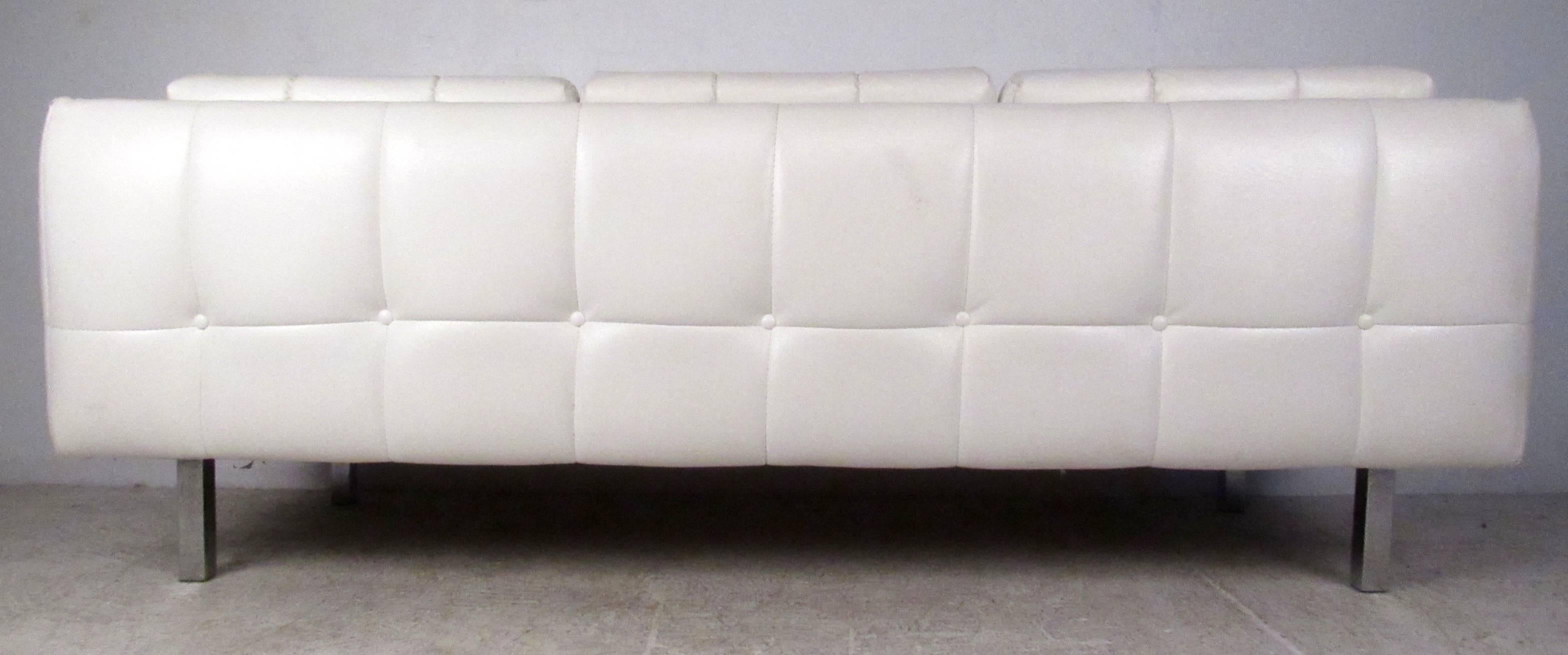 white vinyl sofa
