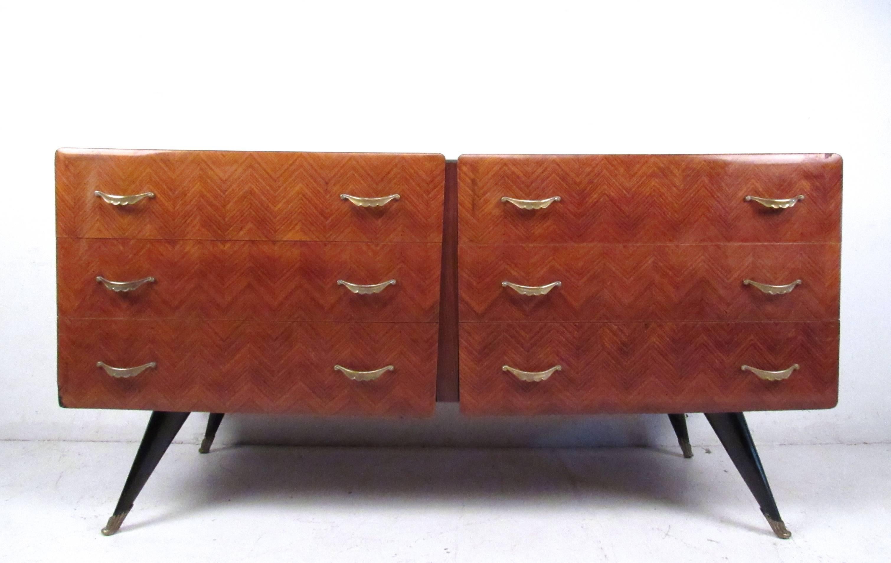 This unique vintage three-drawer dresser combines lacquered parquetry finish with ornate handles, angled tapered legs, and a decorative glass top. Wonderful Mid-Century Italian design makes this a great addition to any distinguished interior.