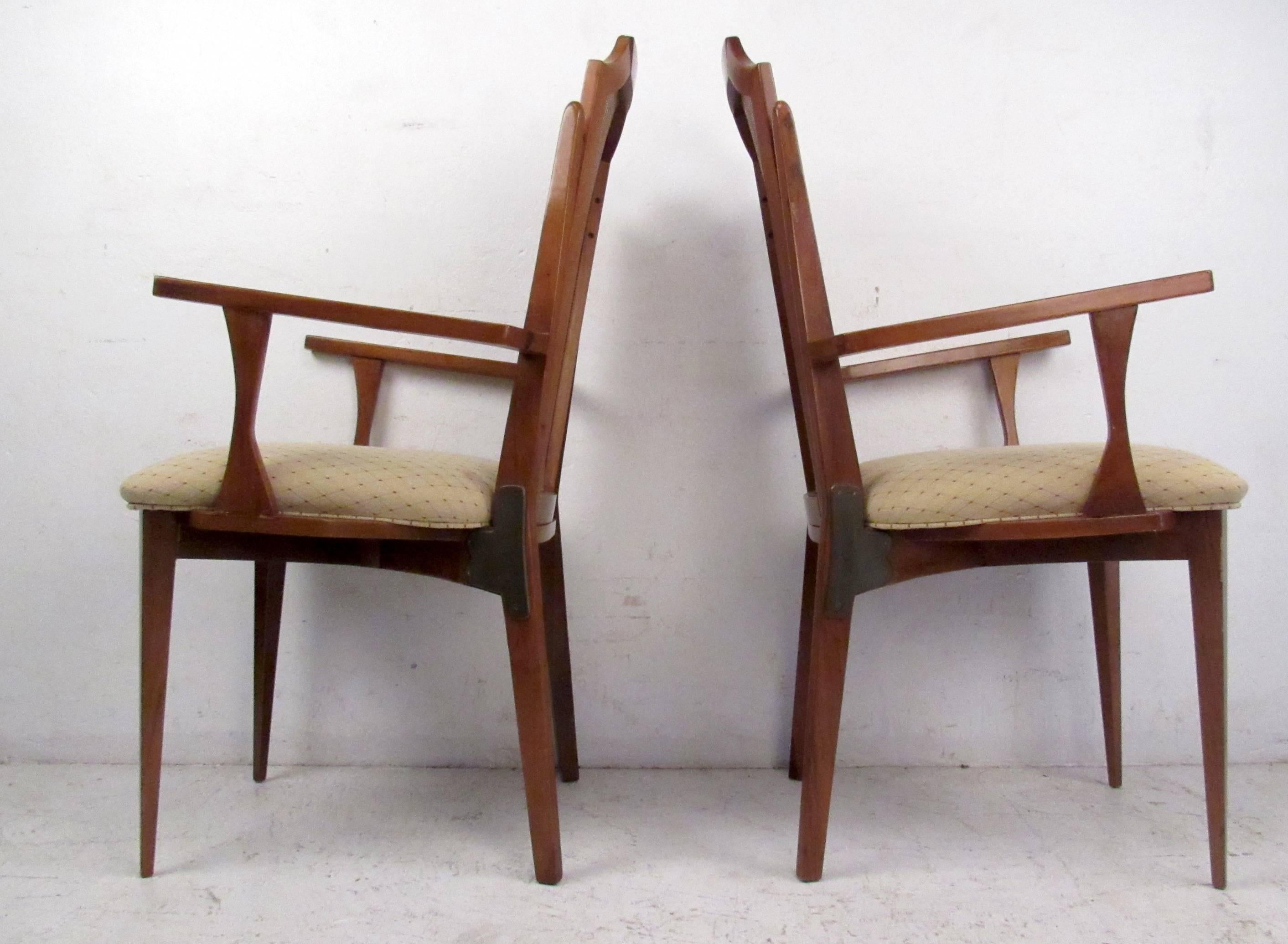 Set of vintage-modern dining room chairs featuring upholstered seats and cane back. Matching dining room table sold separately. 

Please confirm item location NY or NJ with dealer.