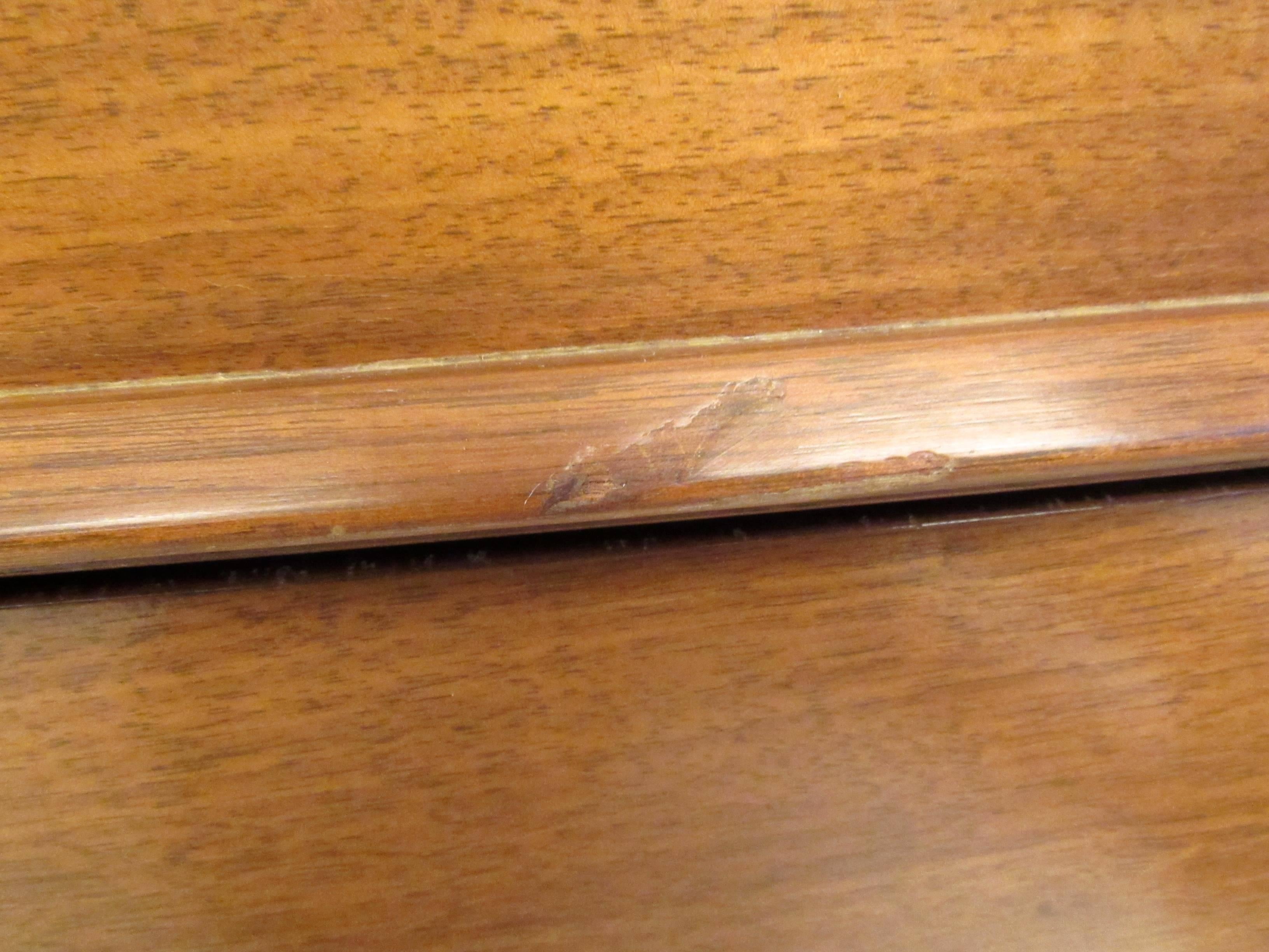 Mid-Century American Walnut Sculpted Front Dresser 1