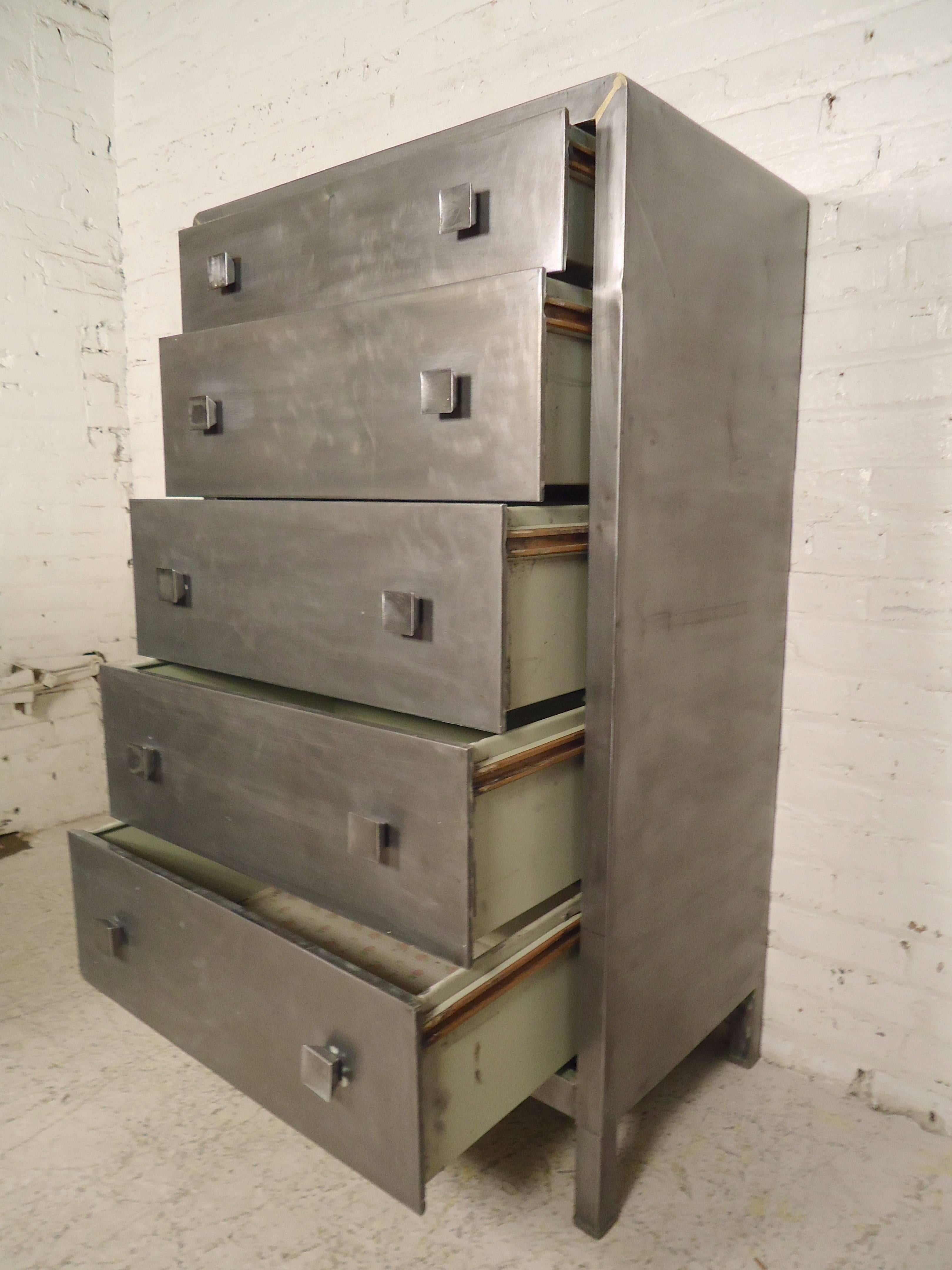 Norman Bel Geddes designed dresser, restored in a handsome Industrial finish. Five wide drawers with square handles, curved top edges, solid metal construction.
Matching small dresser available.

(Please confirm item location - NY or NJ - with