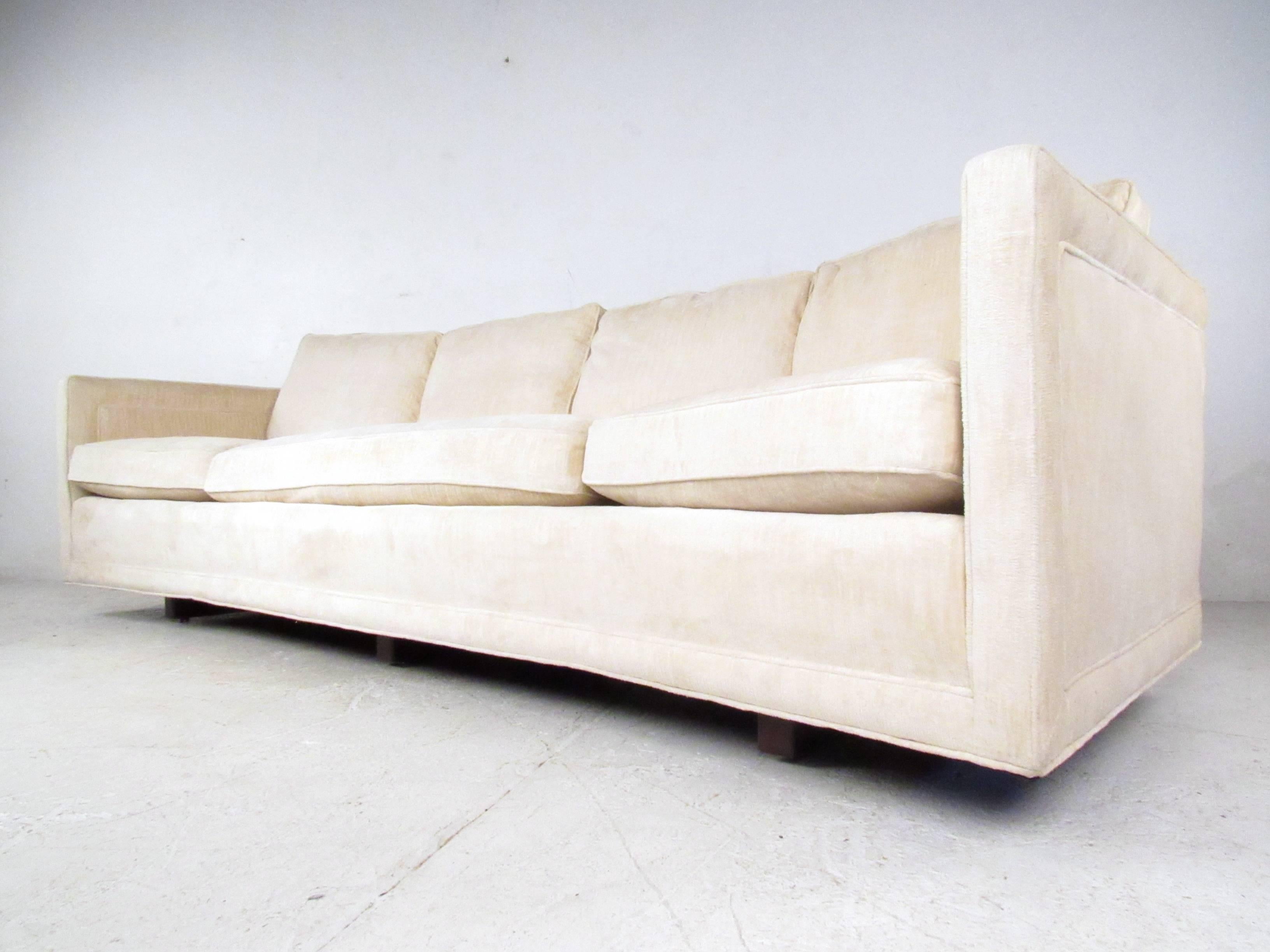 This beautiful oversized sofa was designed for style and comfort by Erwin Lambeth for John Stuart. Unique design, vintage fabric and spacious seating for any interior make this a great choice for home or business. Original manufacturer's label is