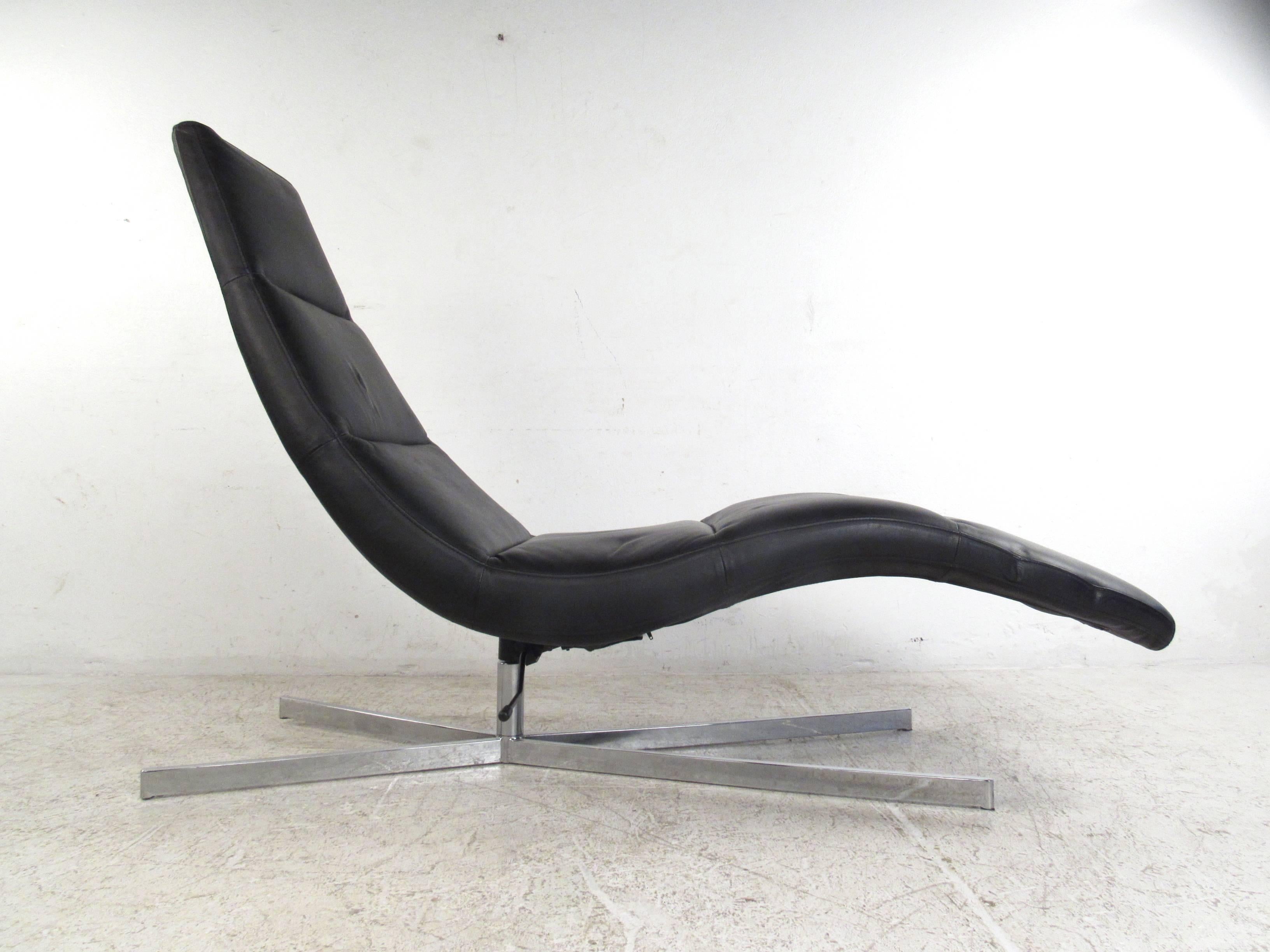 This stylish and comfortable swivel lounge chair makes a fantastic chaise lounge like seating option in any modern interior. Carefully contoured upholstery swivels and reclines on a sturdy X-style chrome base. Rich black leather upholstery