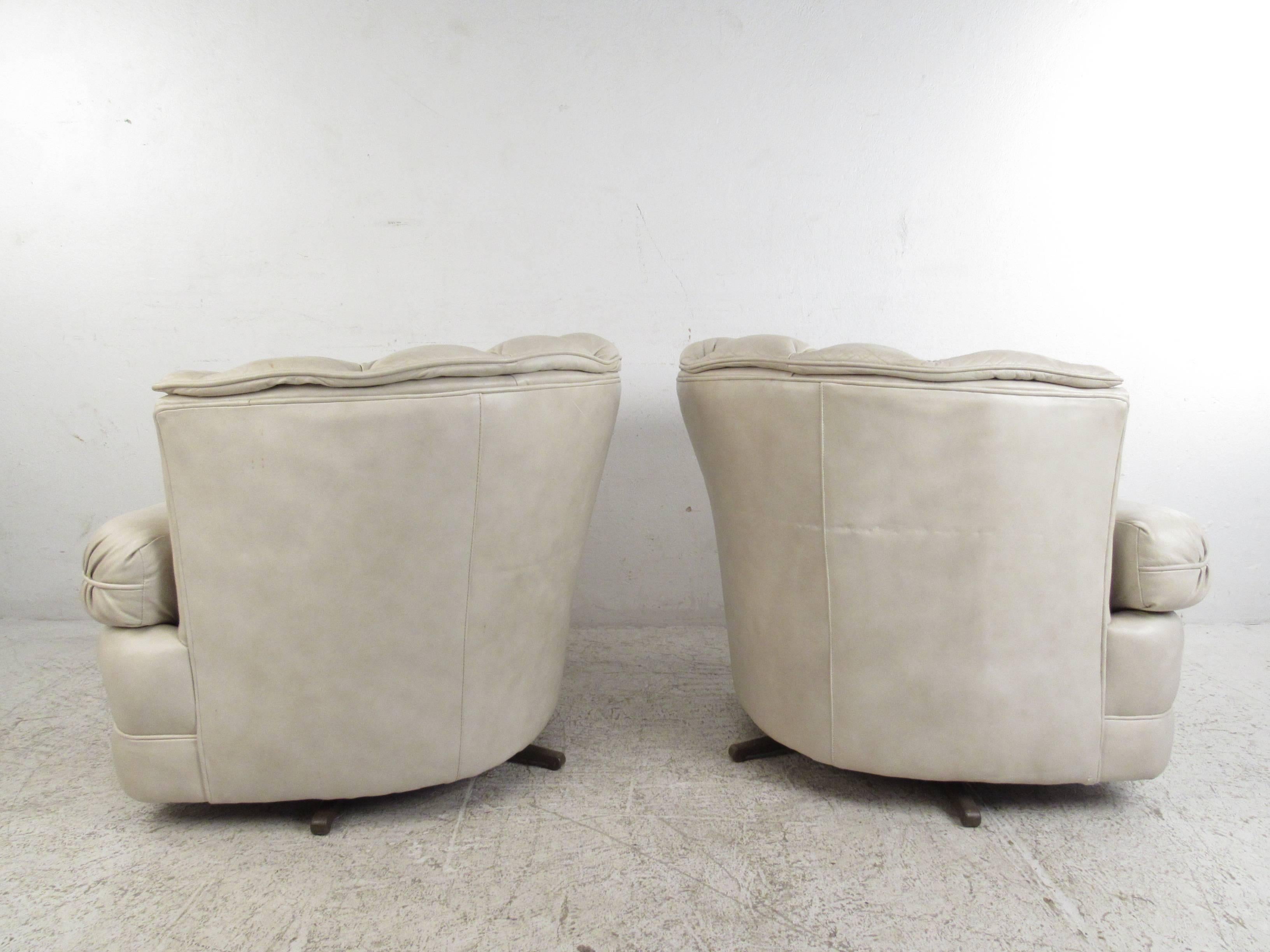 Late 20th Century Pair of Vintage Tufted Leather Swivel Lounge Chairs, Mid-Century Modern