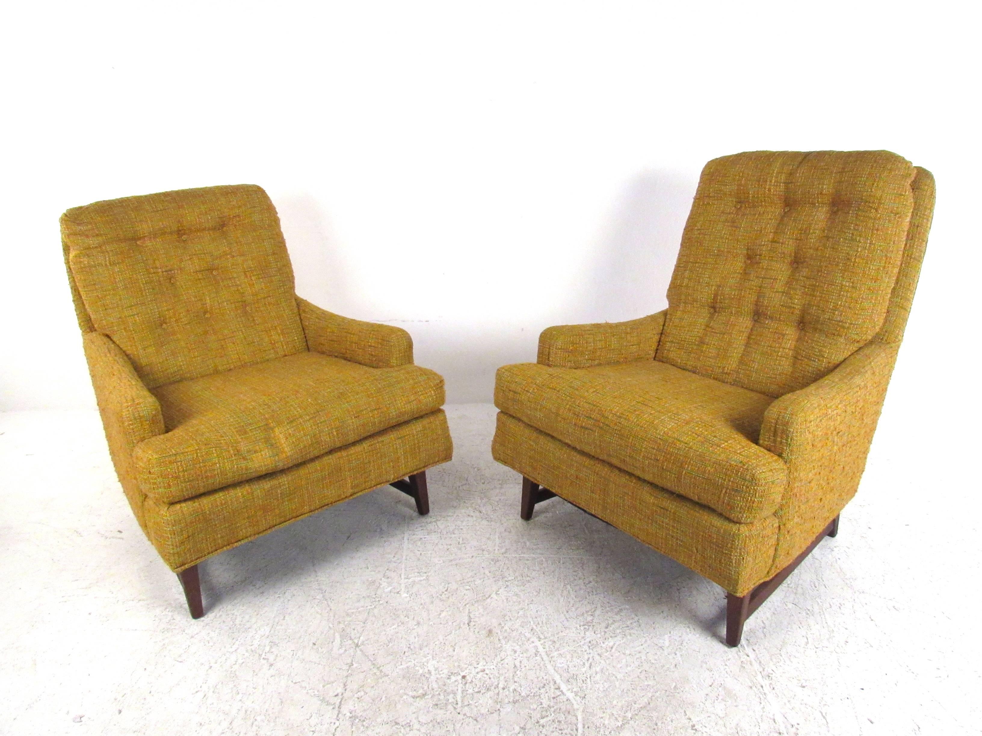 This vintage  lounge chairmakes a comfortable Mid-Century addition to any seating arrangement. Vintage tufted fabric, plush upholstery, and classic vintage style make this an ideal chair for home or lounge use. Please confirm item location (NY or